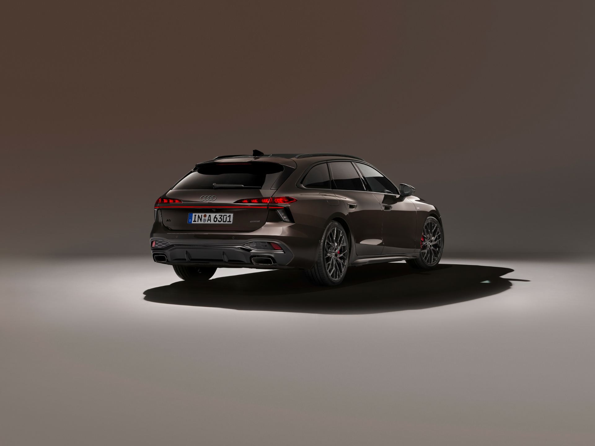 2026 audi a6 avant rear three quarter studio brown