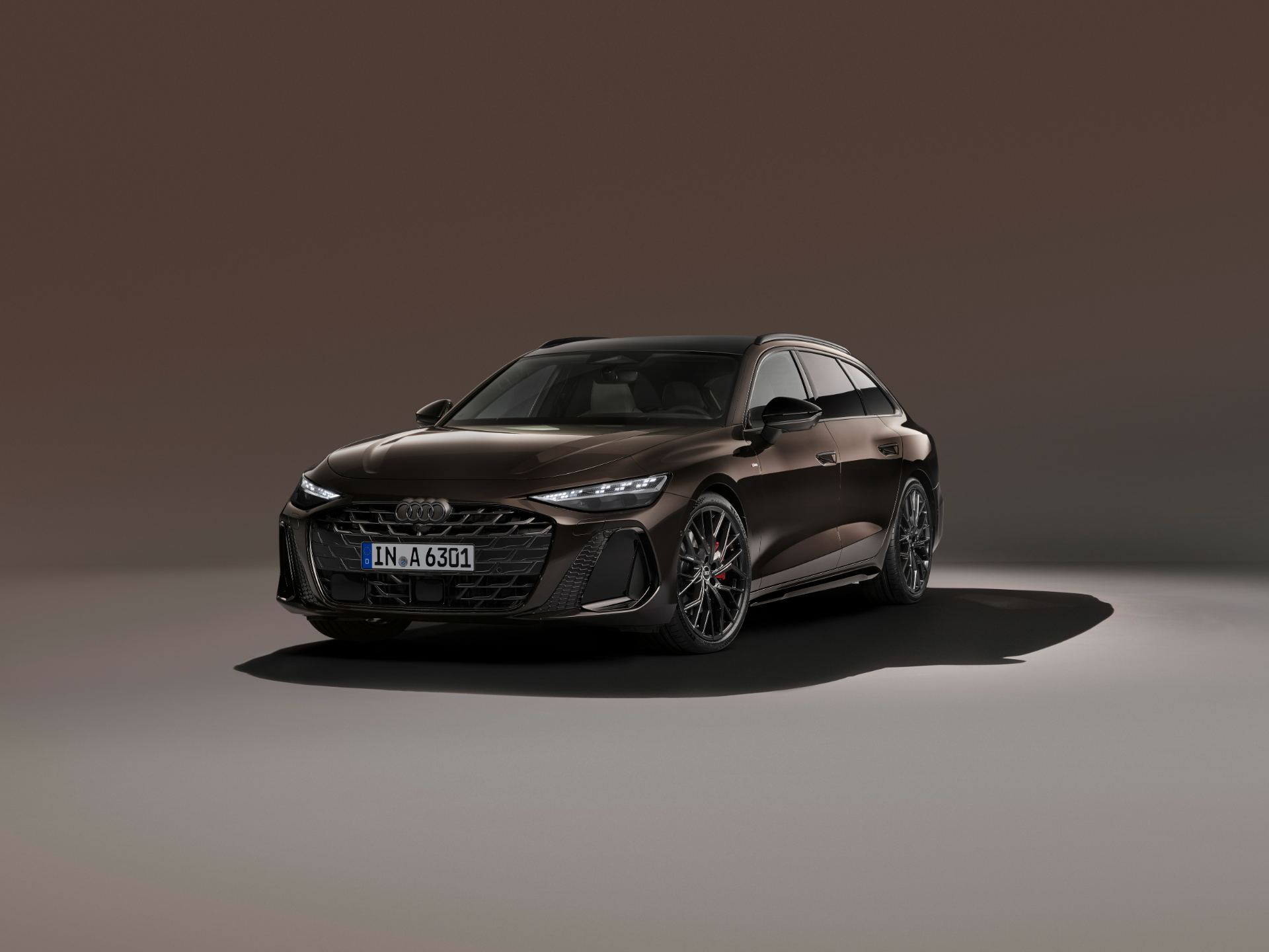 2026 audi a6 avant front three quarter studio brown