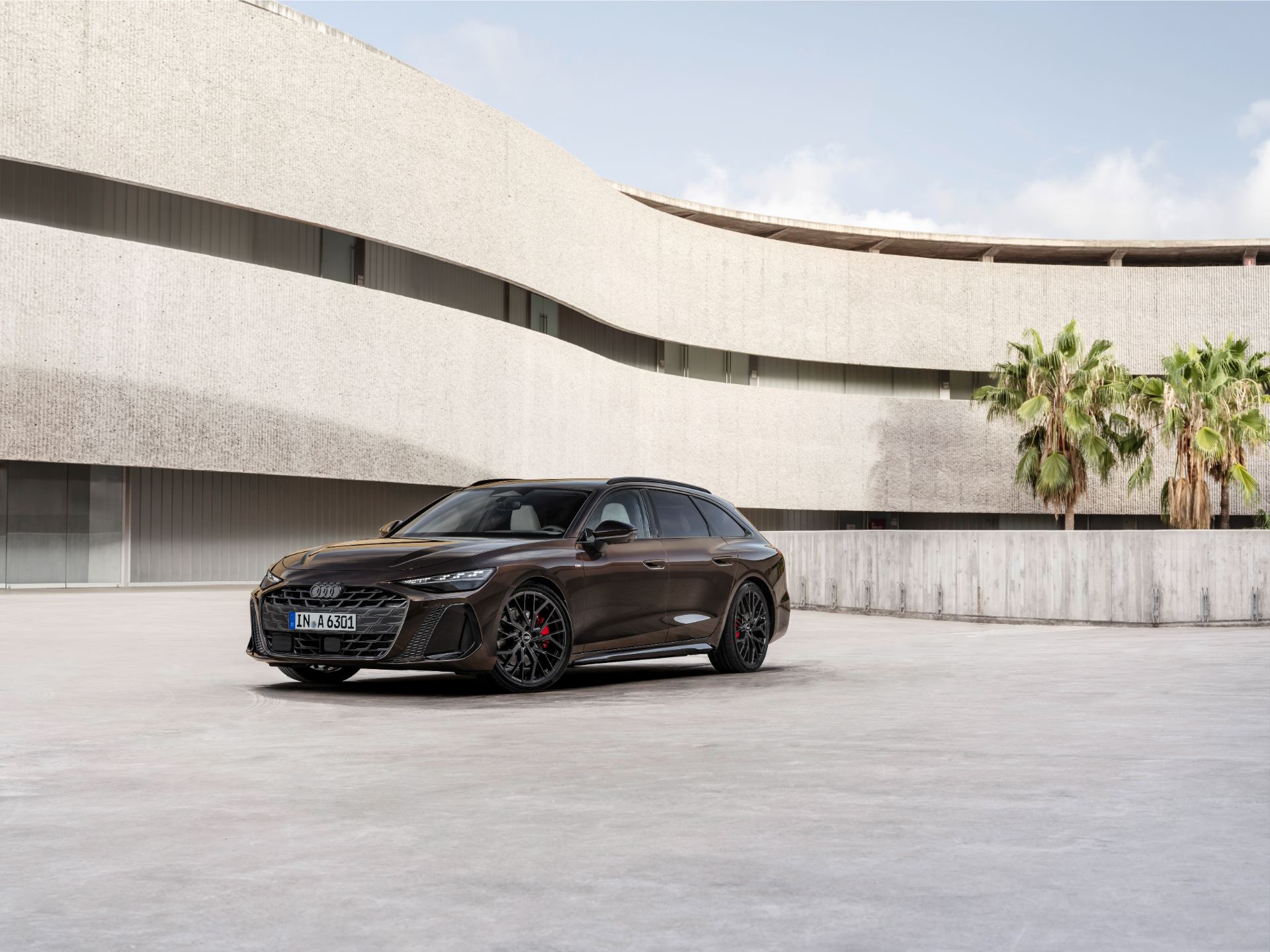 2026 audi a6 avant front three quarter architecture brown