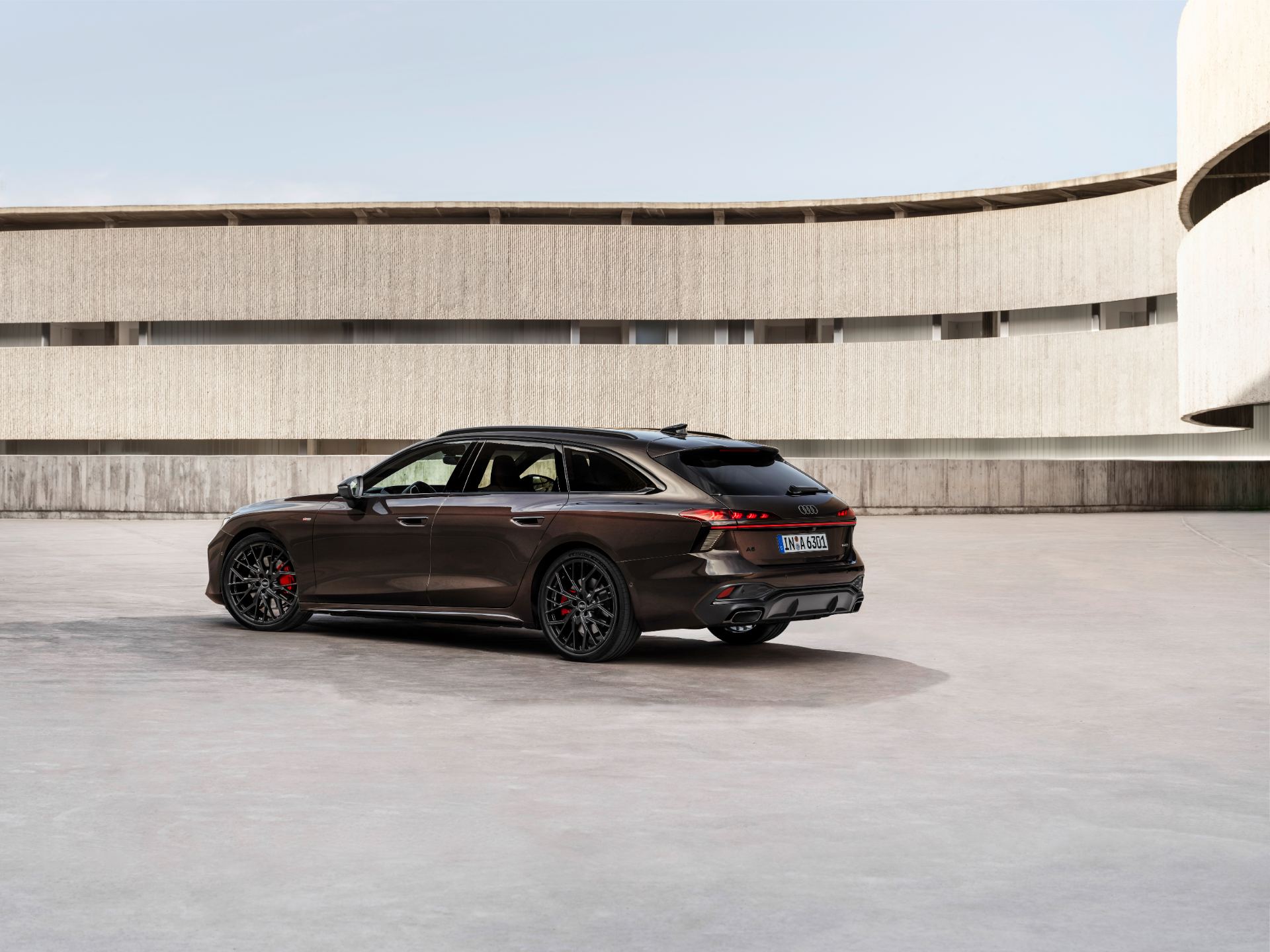 2026 audi a6 avant rear three quarter courtyard brown