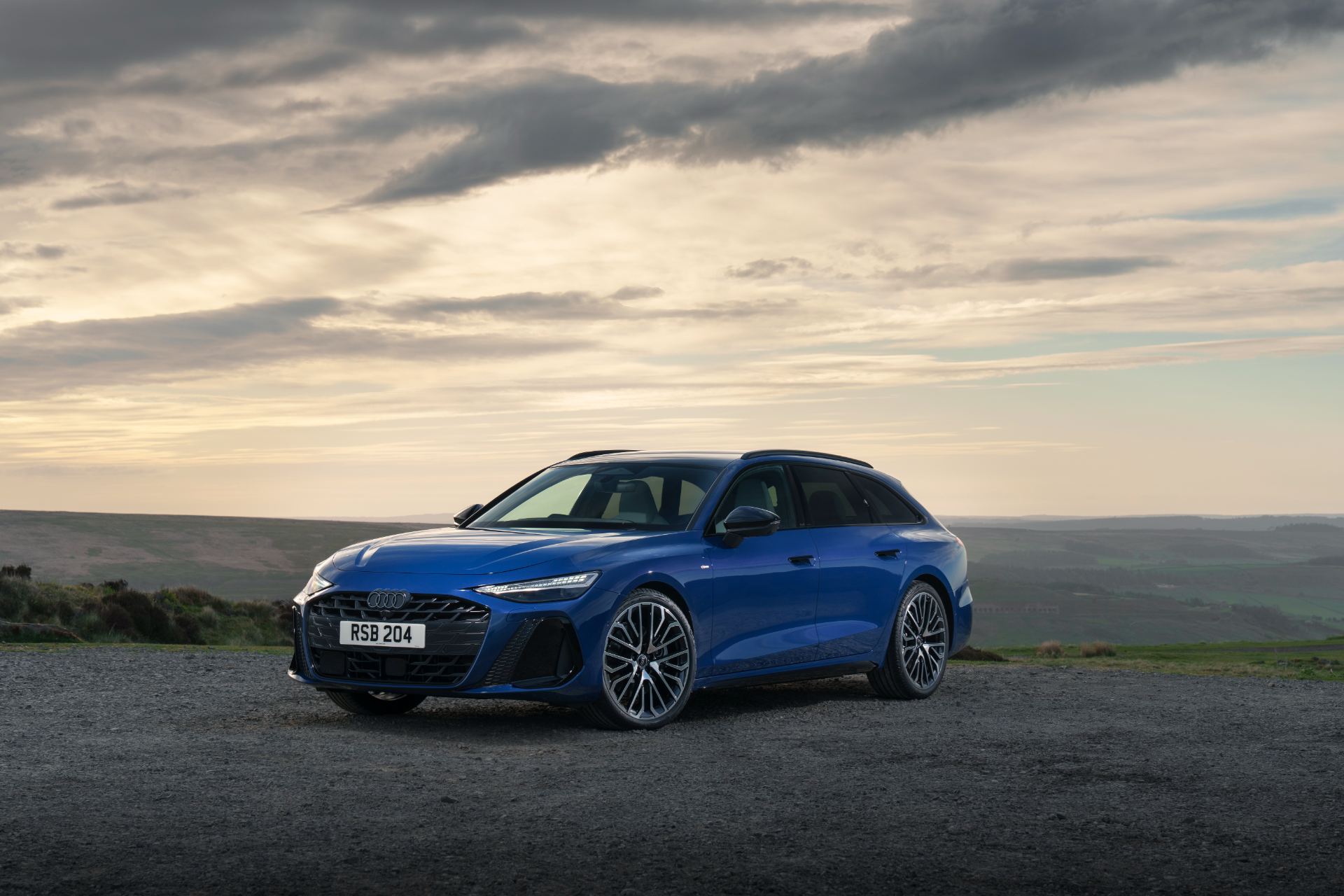 2026 audi a6 avant front three quarter moorland blue