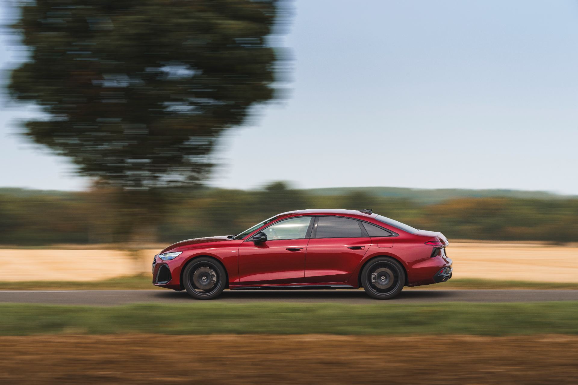 2026 audi a6 saloon e hybrid driving side profile red