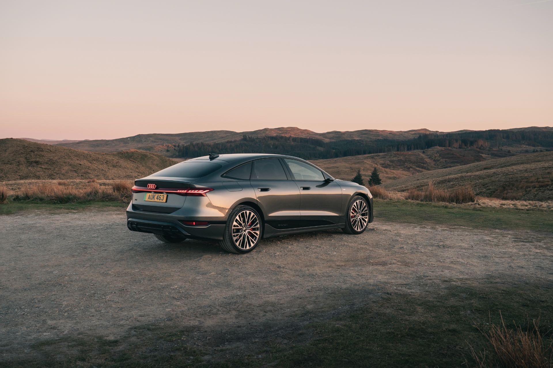 2026 audi a6 sportback e tron rear three quarter dusk grey