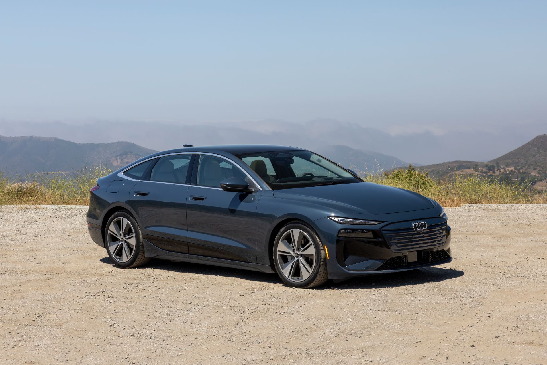 2027 audi a6 sportback e tron front three quarter hilltop grey