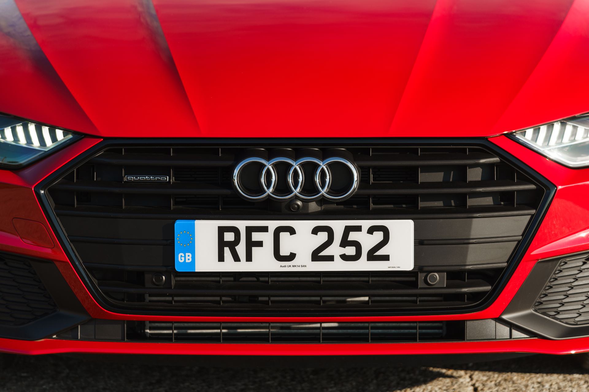 2025 audi a7 sportback grille quattro badge red