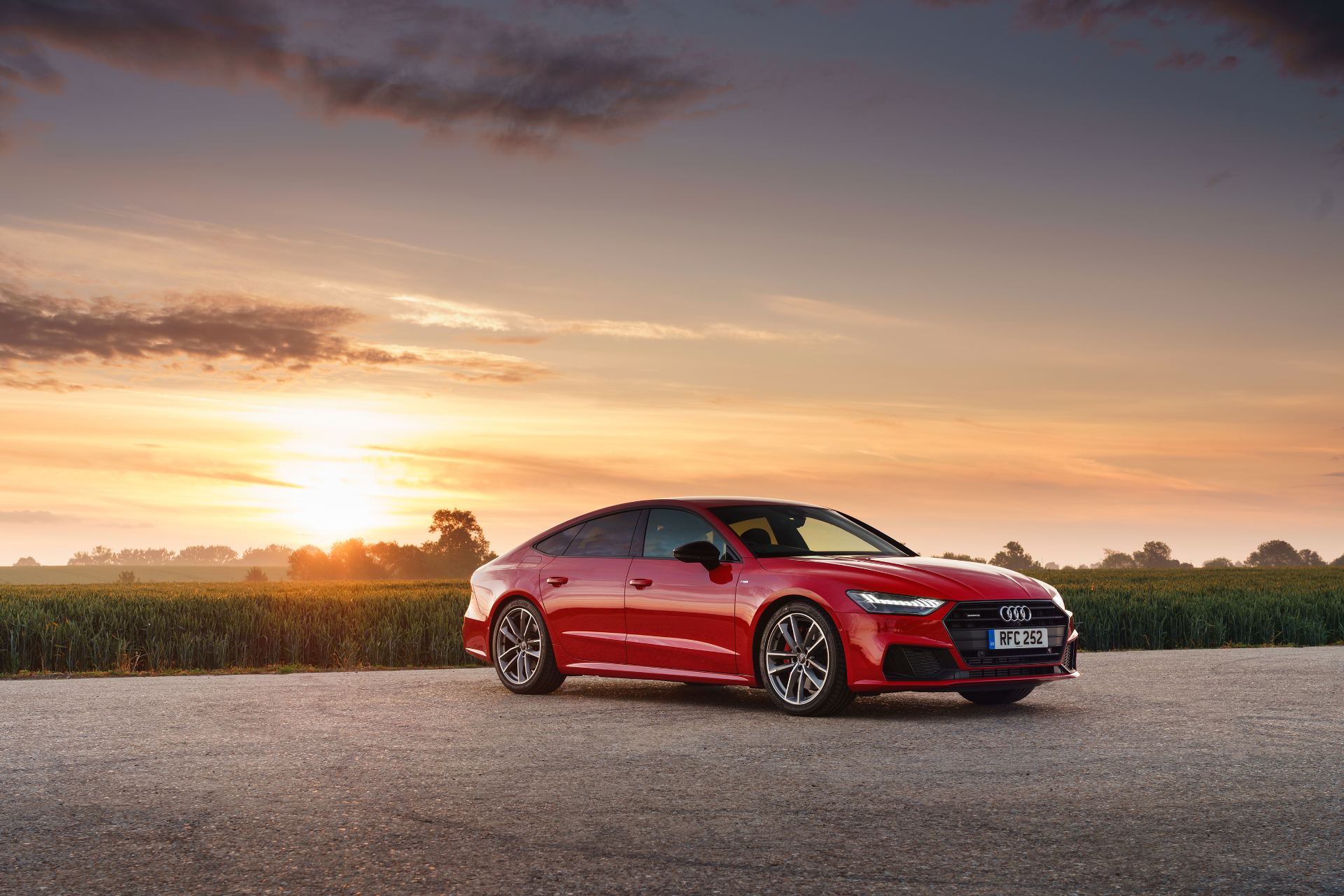 2025 audi a7 sportback front three quarter sunset red