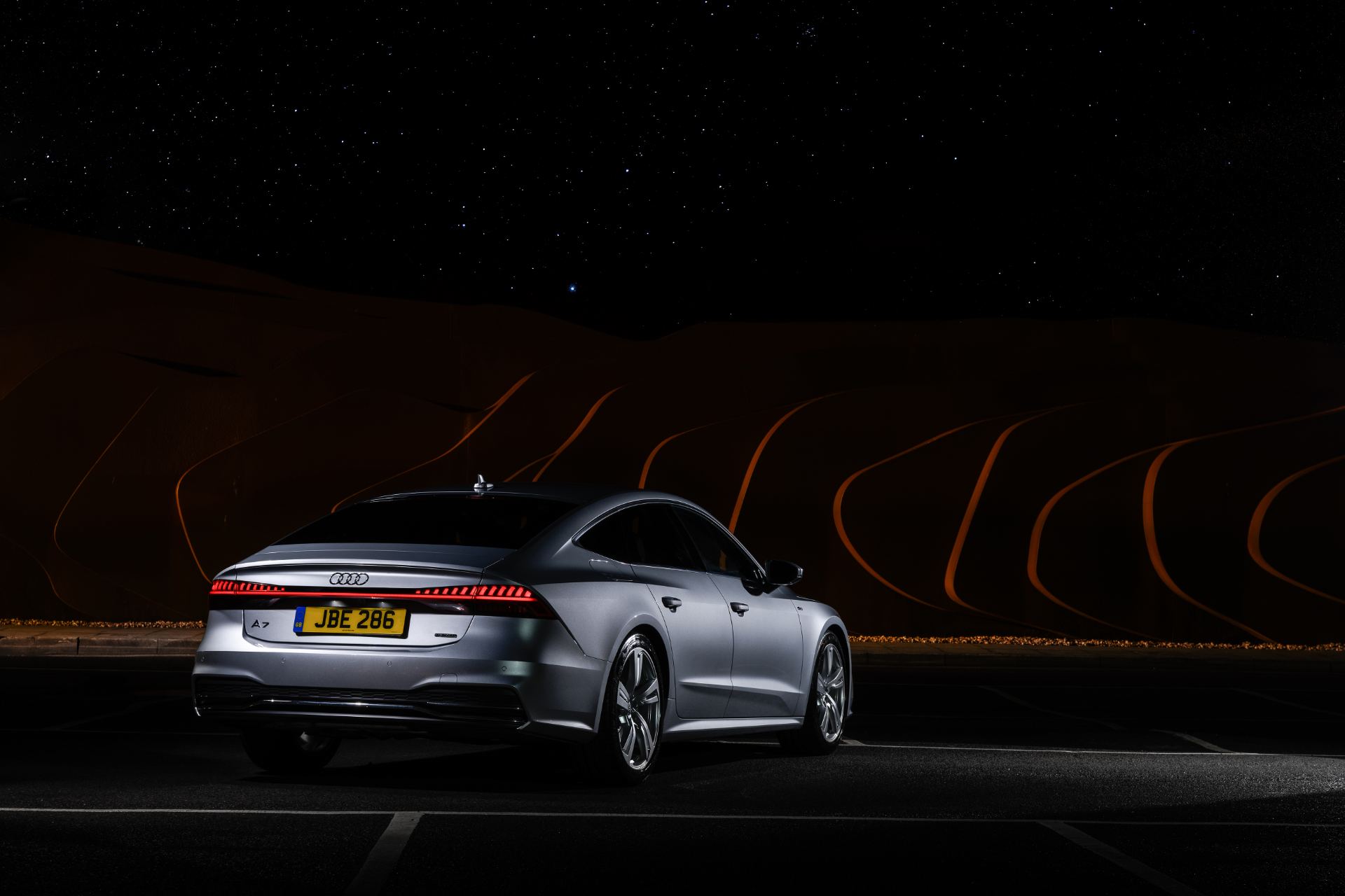 2025 audi a7 sportback rear three quarter night sculpture silver