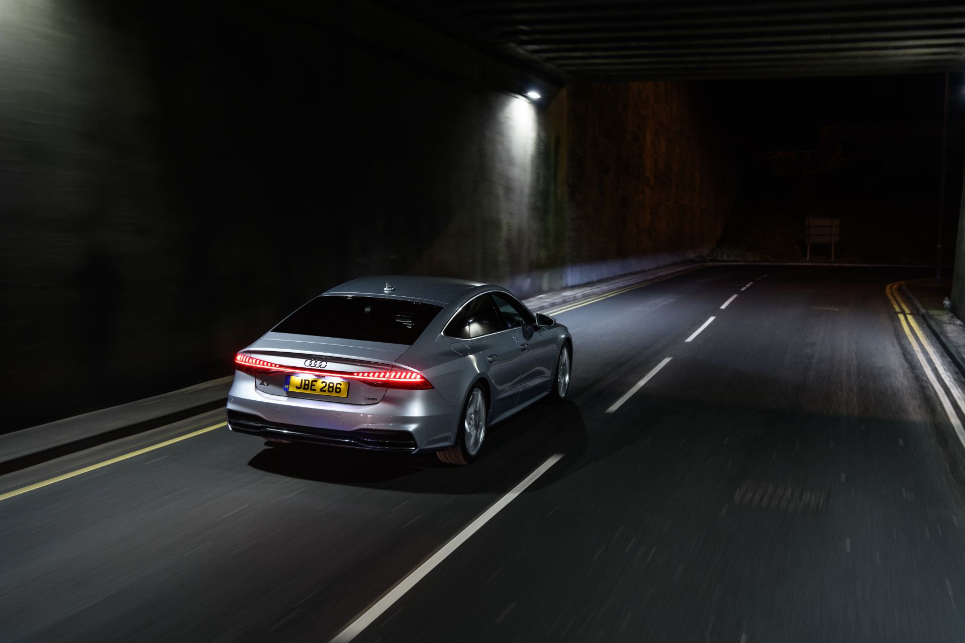 2025 audi a7 sportback driving rear tunnel silver