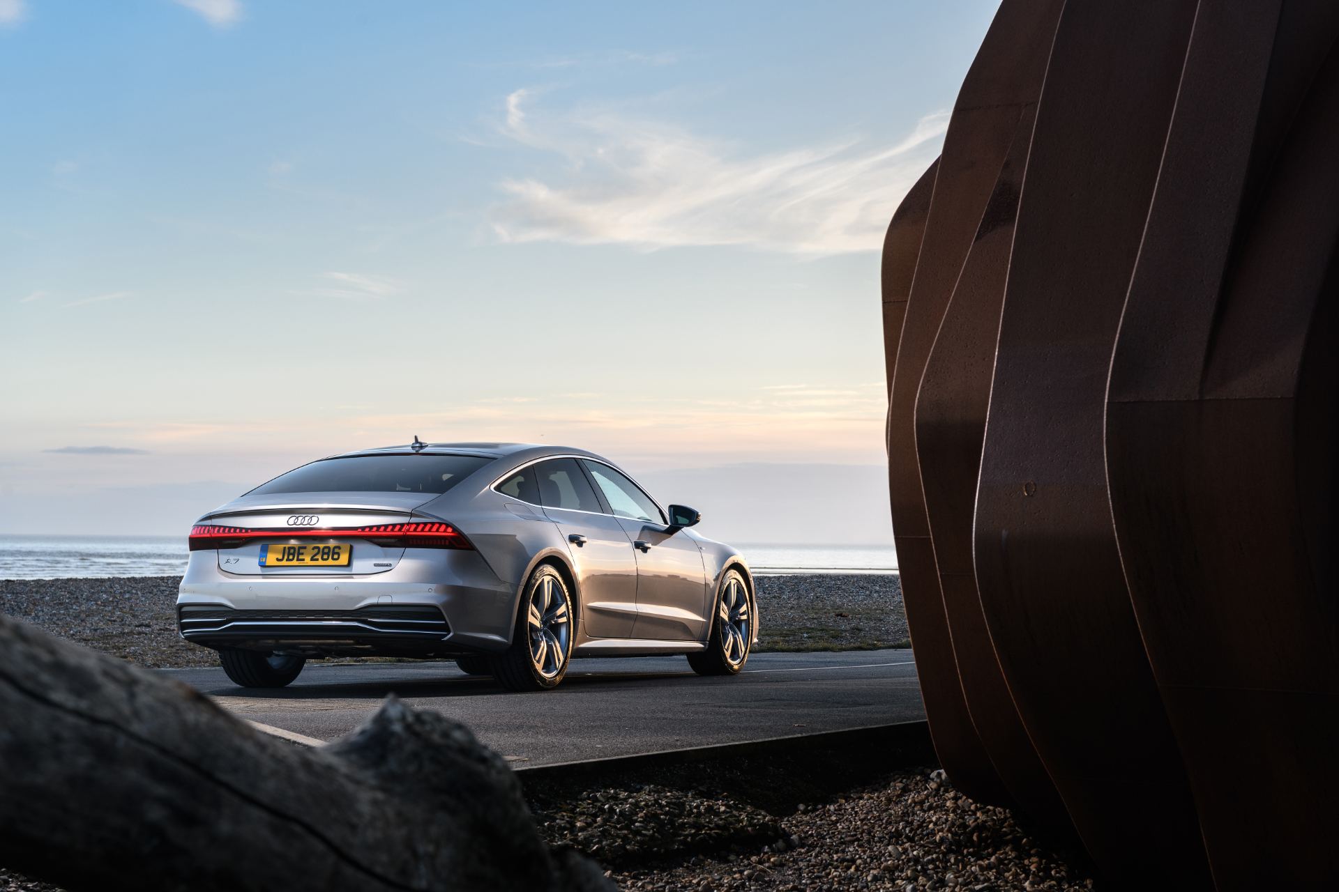 2025 audi a7 sportback rear three quarter coast sculpture silver
