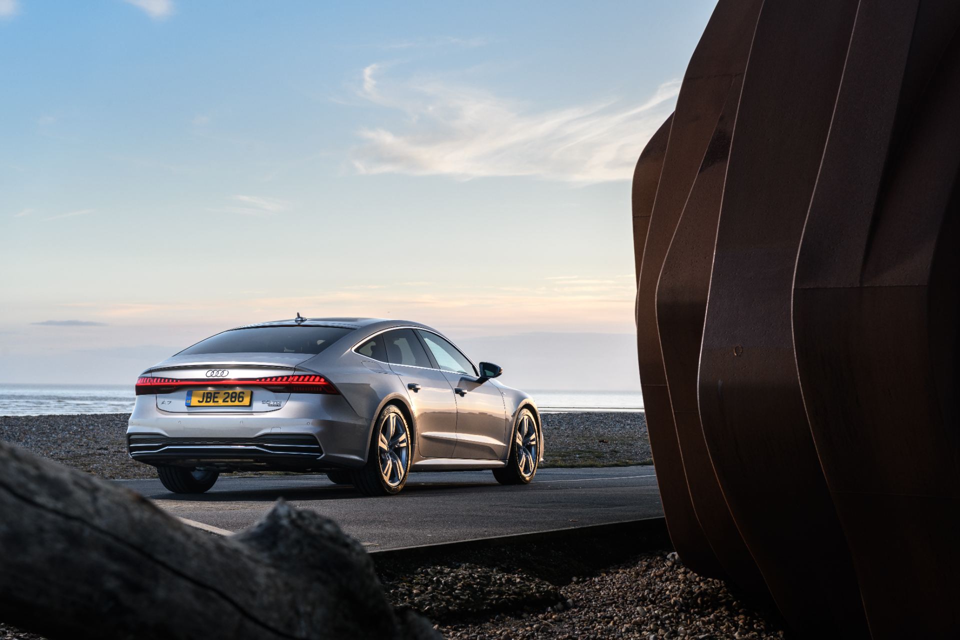 2025 audi a7 sportback rear three quarter coast sculpture silver