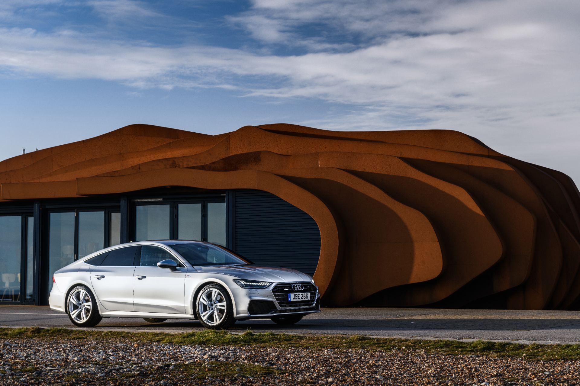 2025 audi a7 sportback front three quarter architecture silver