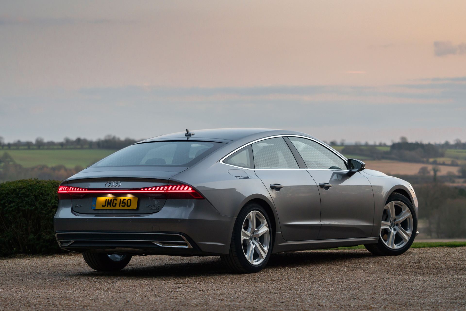 2025 audi a7 sportback rear three quarter dusk grey