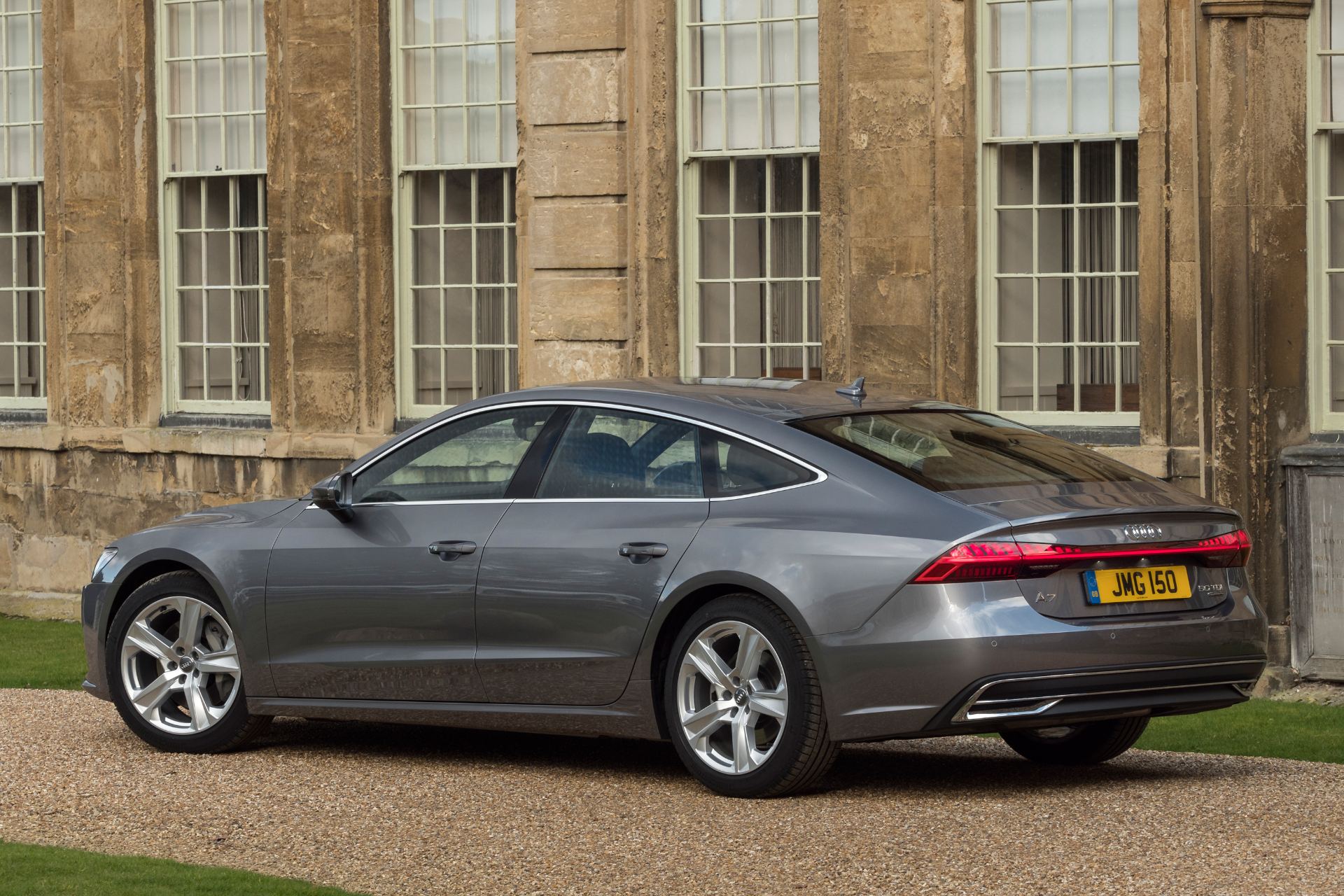 2025 audi a7 sportback rear three quarter country house grey