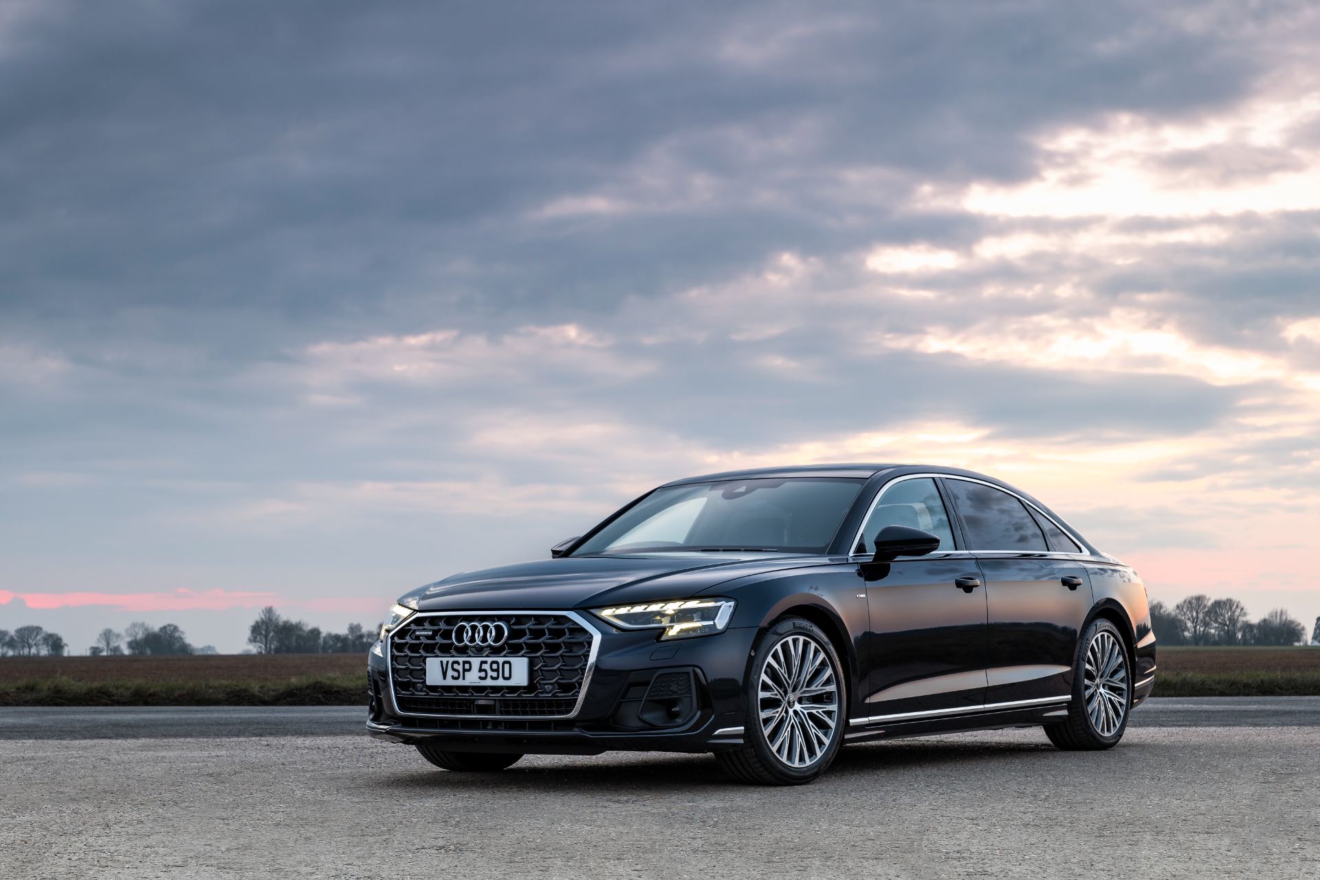 2025 audi a8 front three quarter sunset black