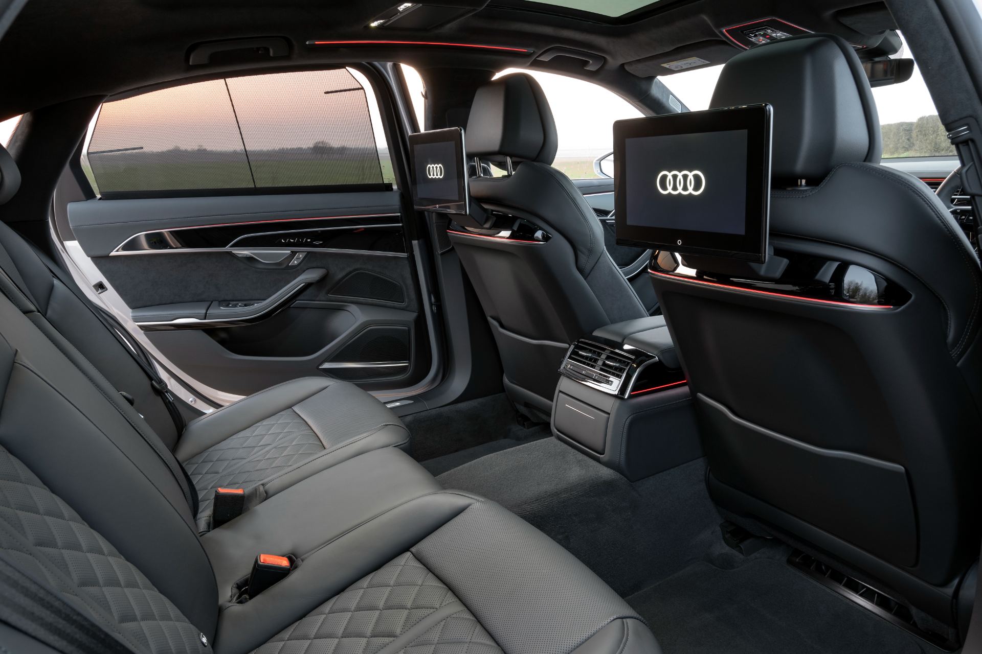 2025 audi a8 60 tfsi e interior rear seats entertainment