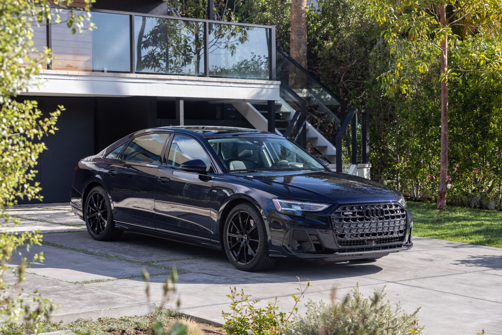 audi a8 l front three quarter house dark blue