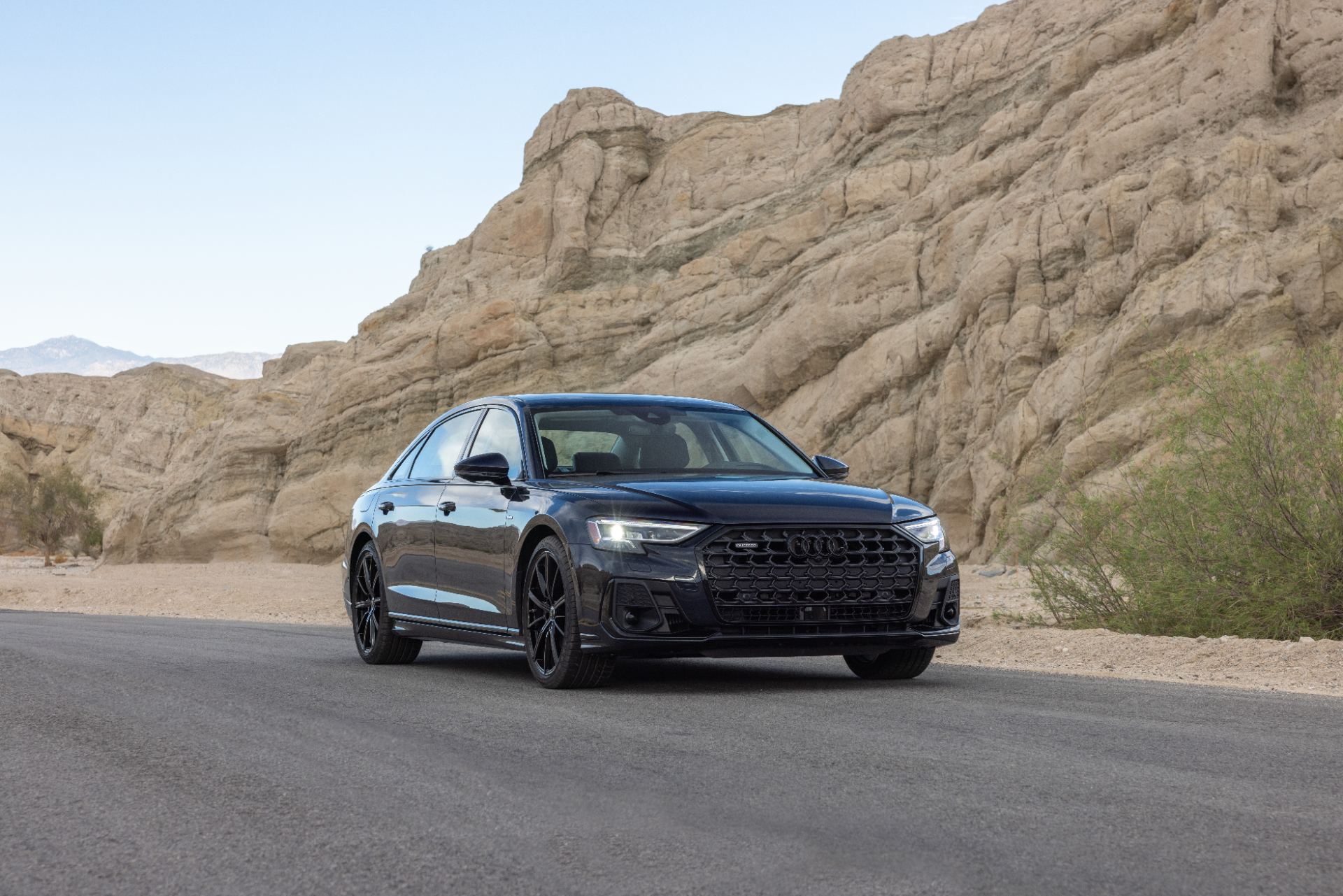 audi a8 l front three quarter canyon dark blue