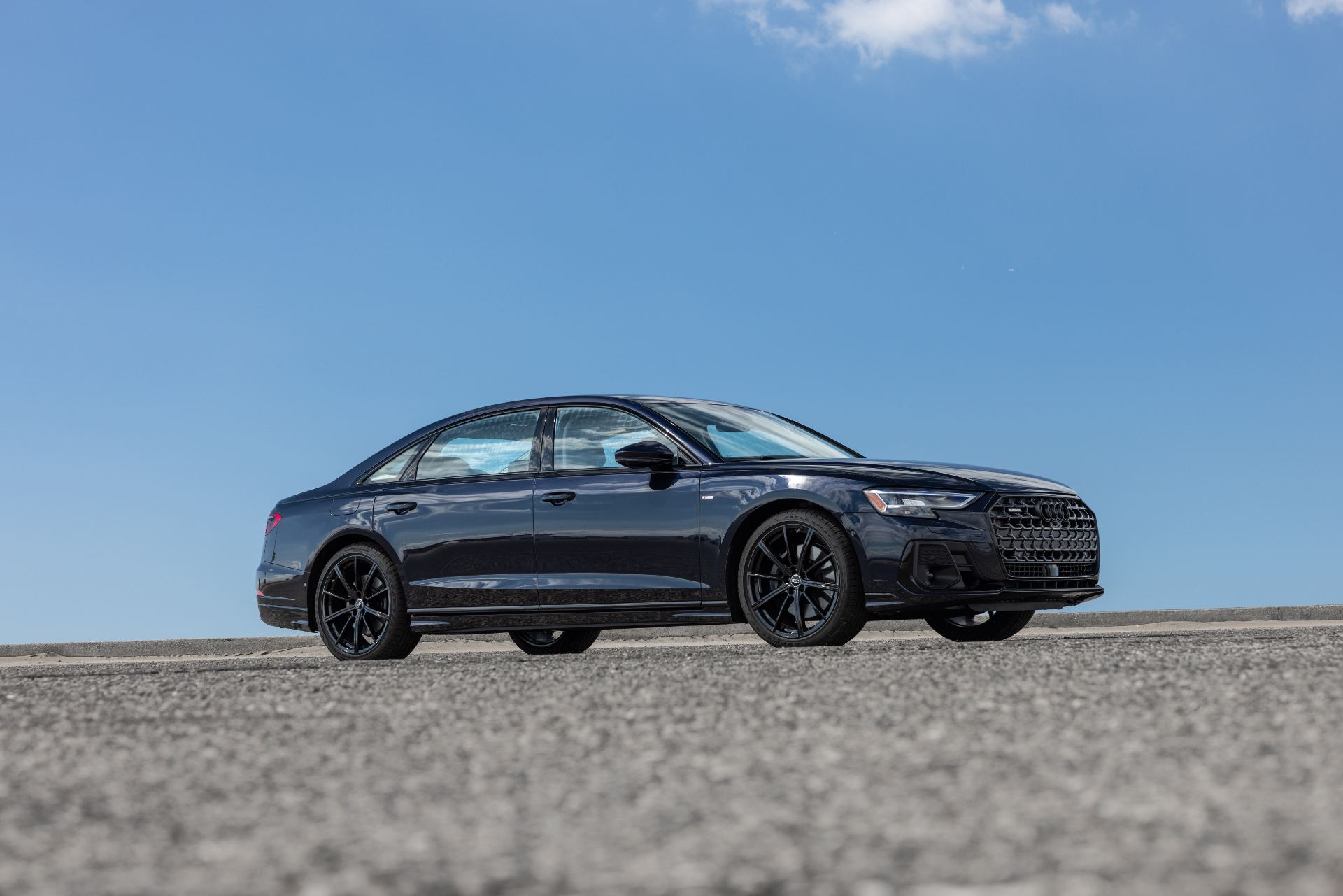 audi a8 l side profile low angle dark blue