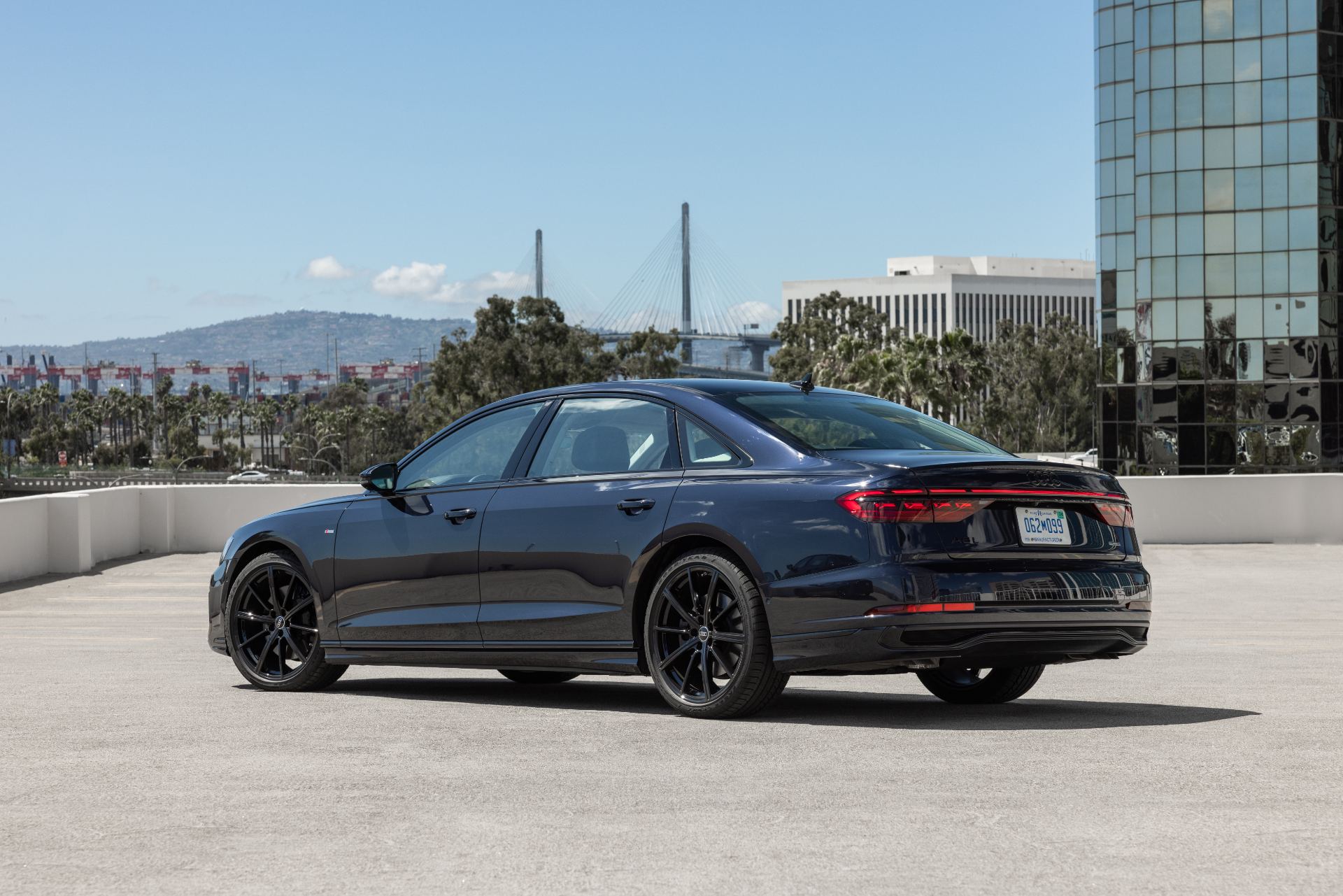 audi a8 l rear three quarter parking deck dark blue
