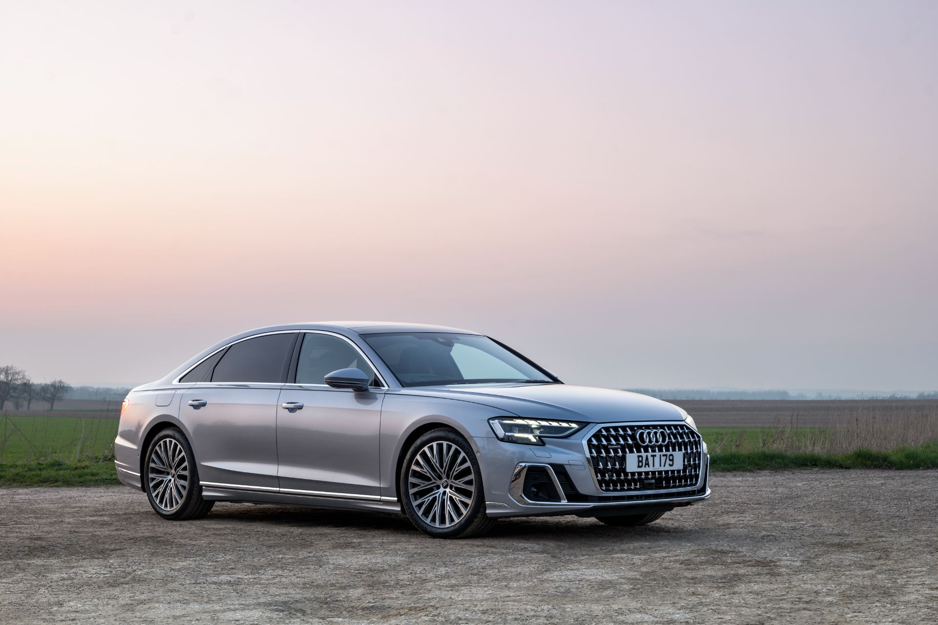 2025 audi a8 60 tfsi e front three quarter dusk silver