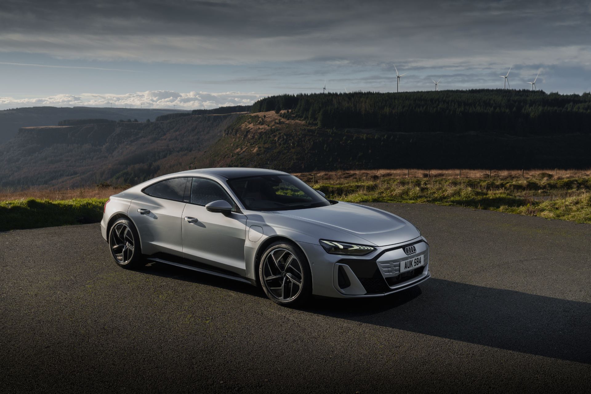 2026 audi e tron gt quattro front three quarter cloudy silver