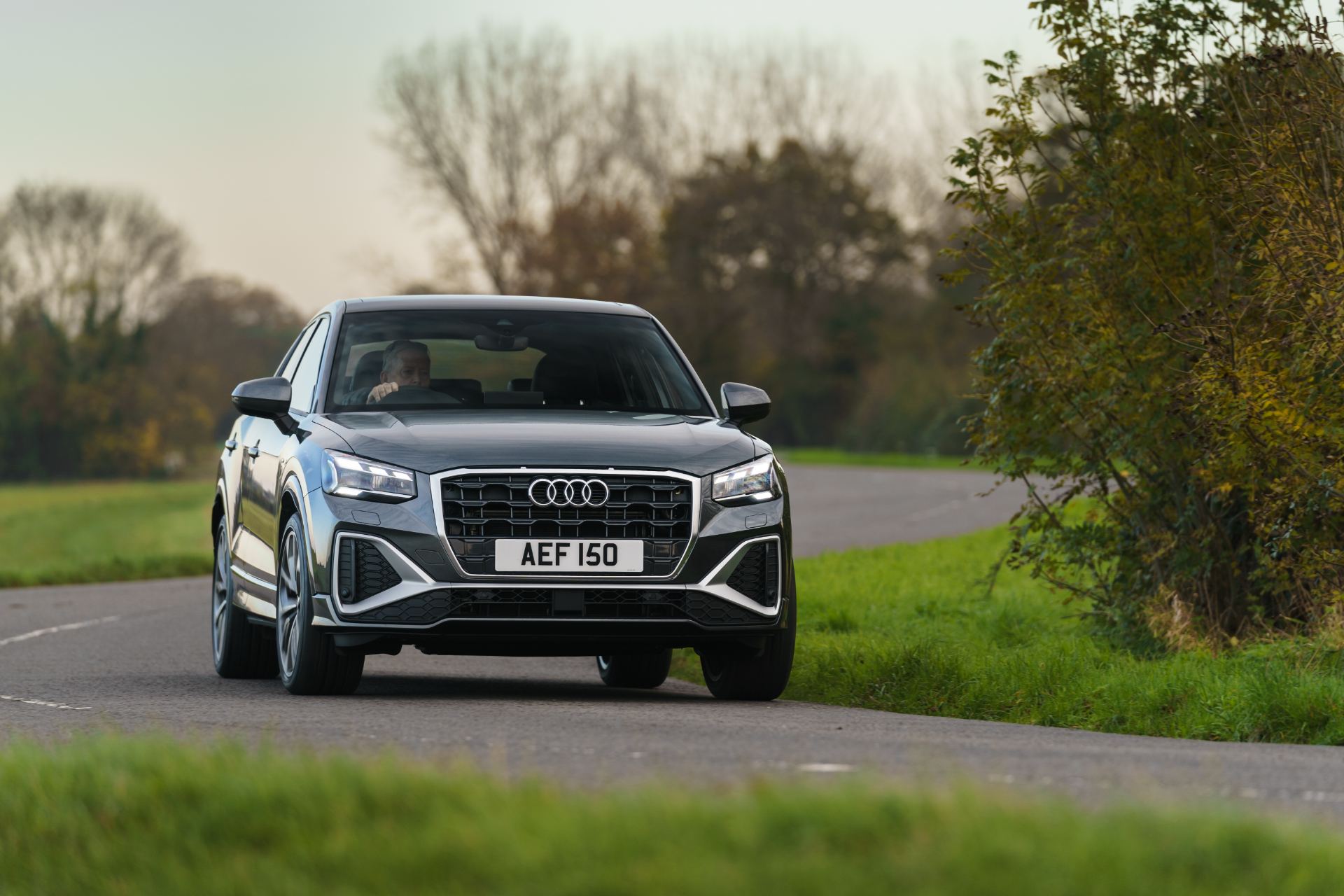 2025 audi q2 driving front lane grey