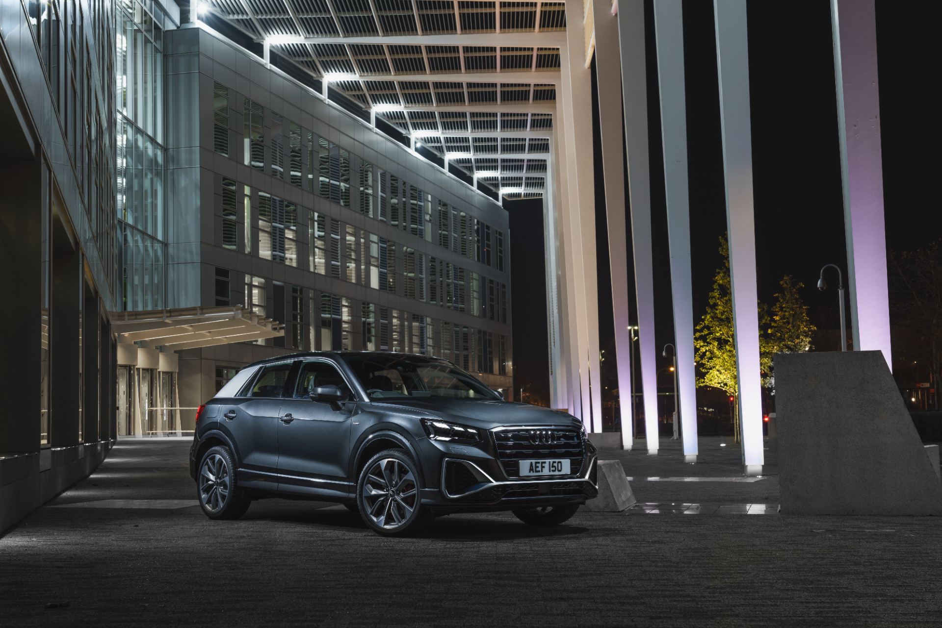 2025 audi q2 front three quarter night architecture grey