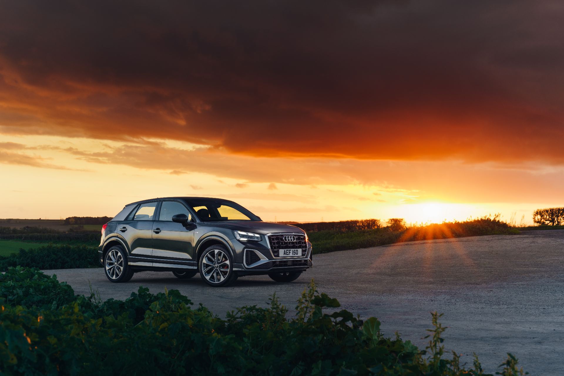 2025 audi q2 front three quarter sunset grey