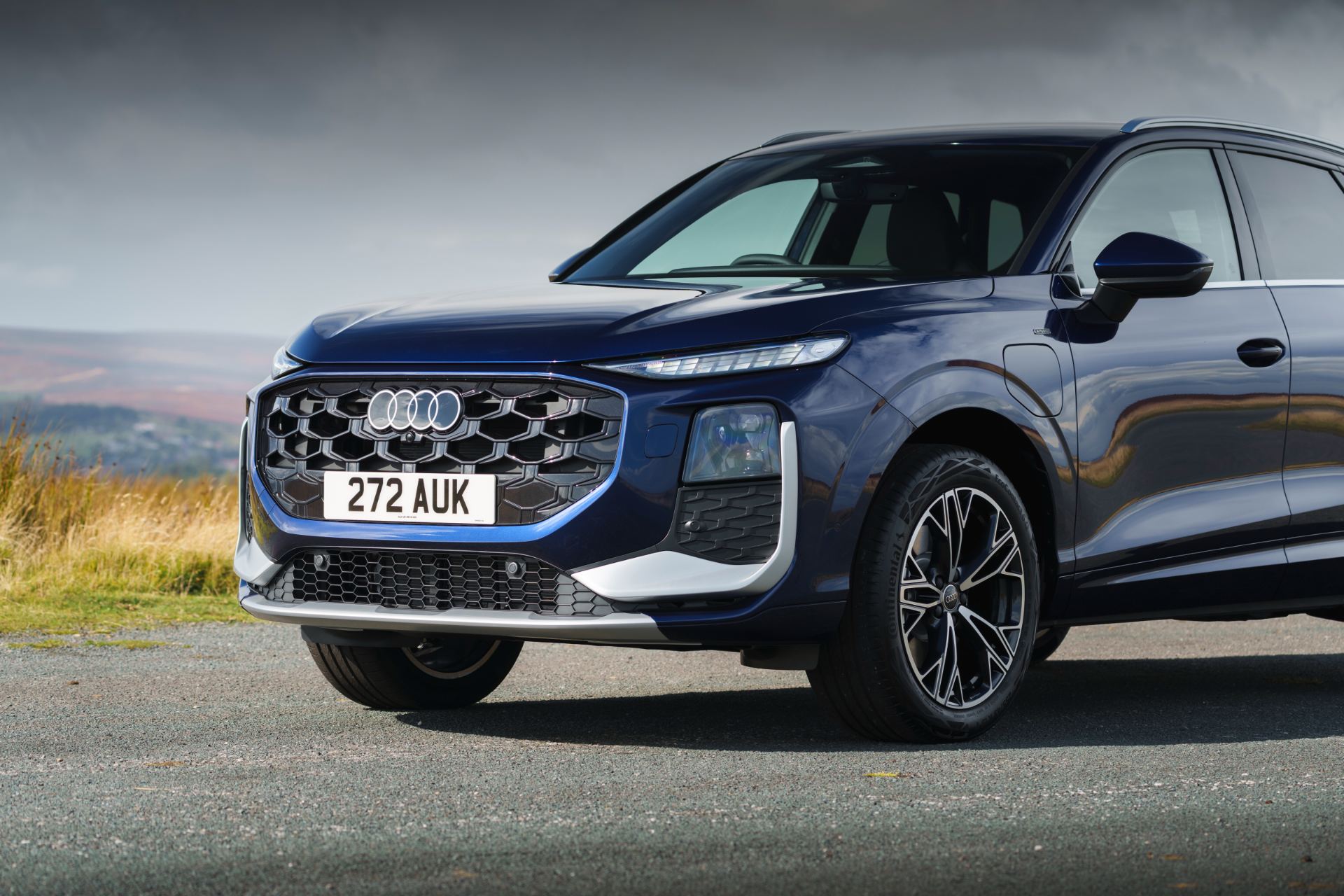 2026 audi q3 e hybrid front three quarter detail blue