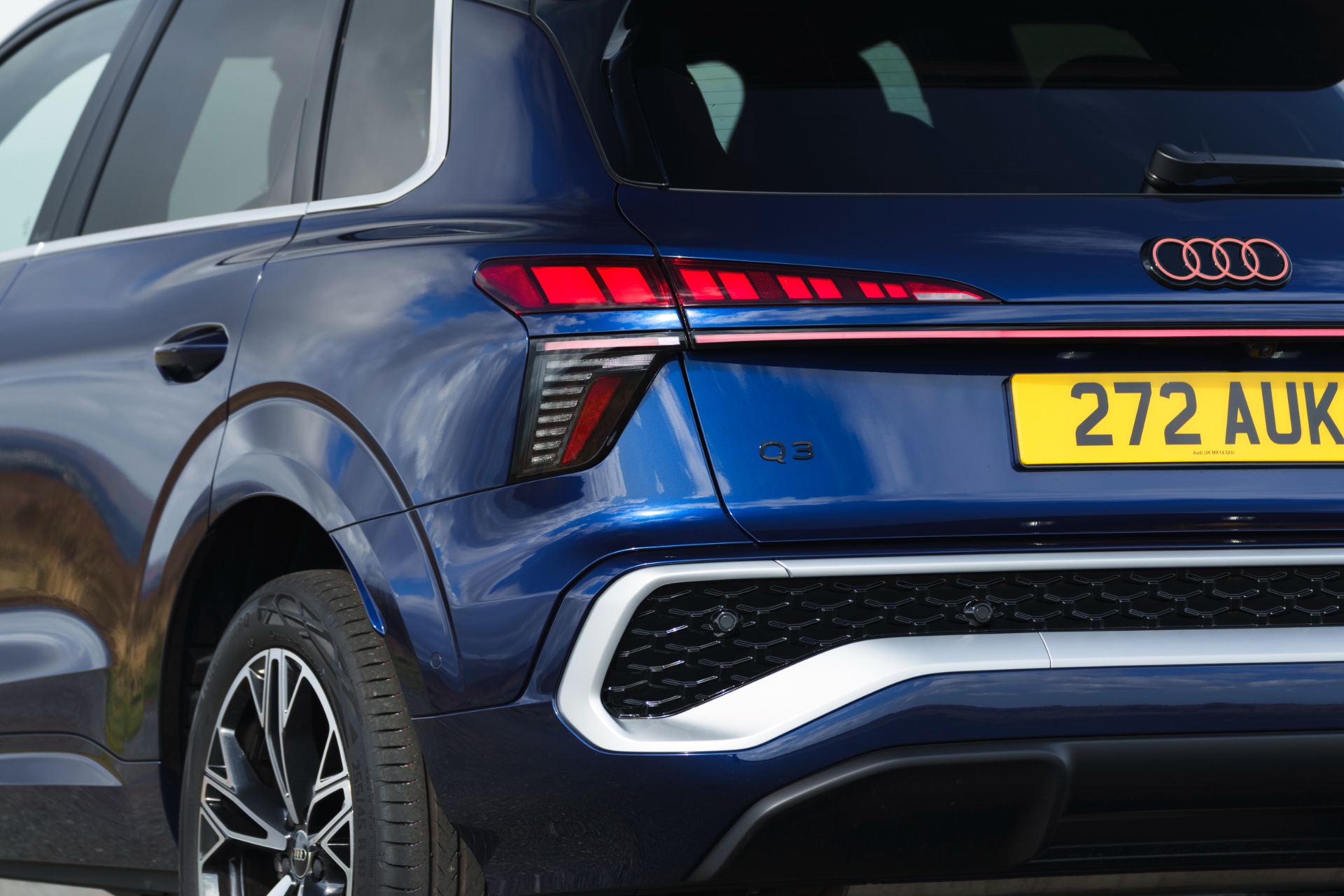 2026 audi q3 e hybrid rear detail blue