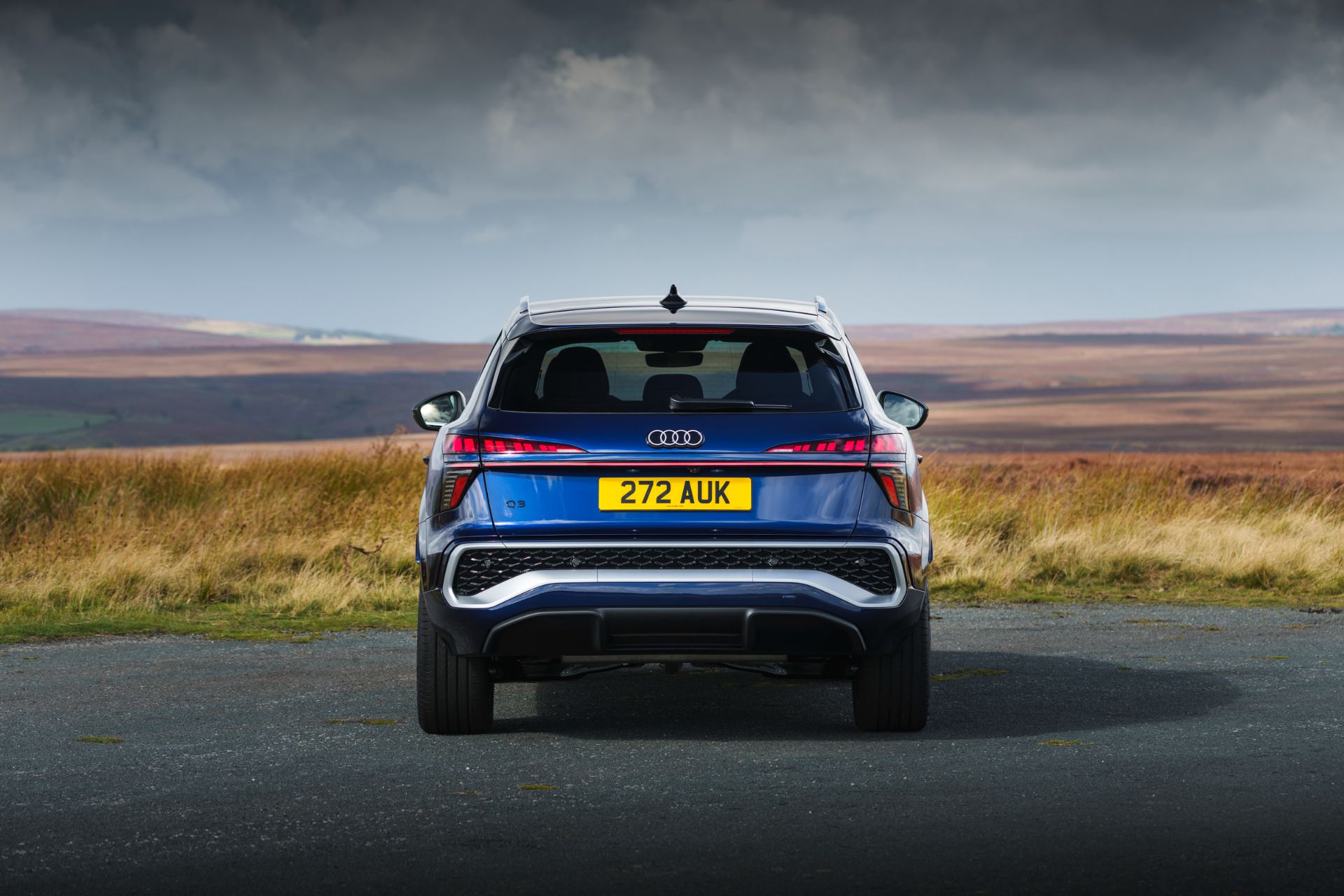 2026 audi q3 e hybrid rear moorland road blue