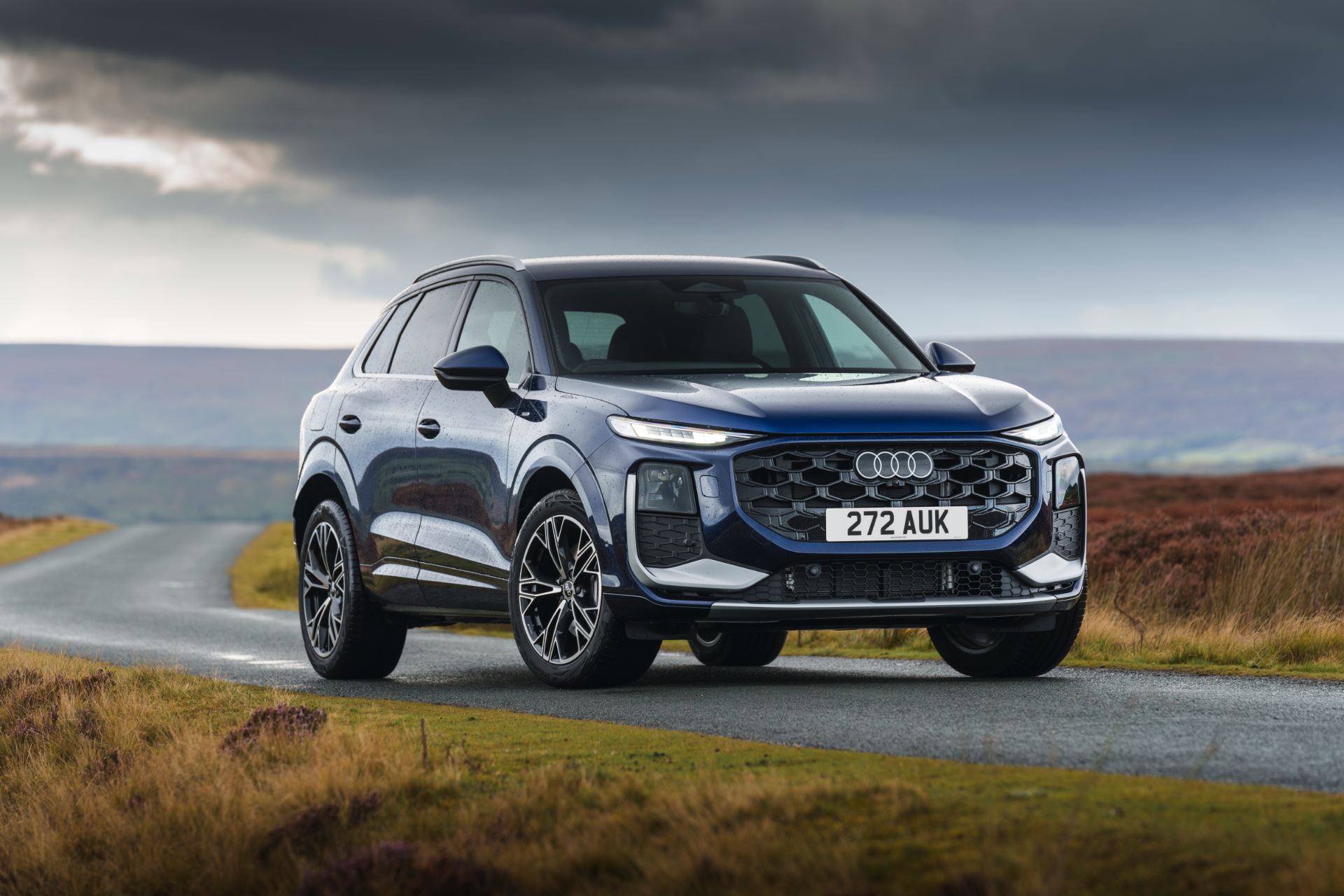2026 audi q3 e hybrid front three quarter moorland blue