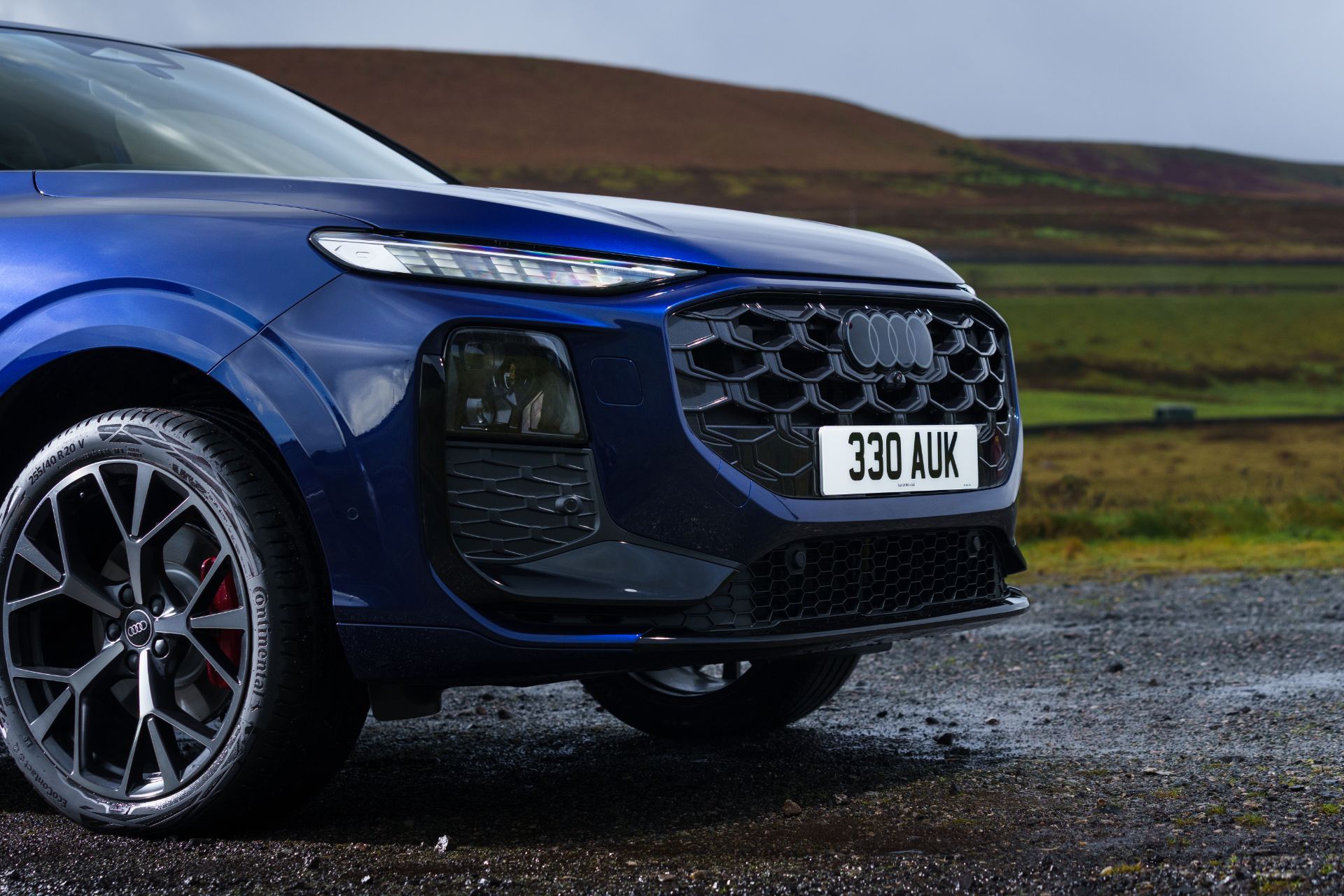 2026 audi q3 sportback e hybrid front three quarter detail blue