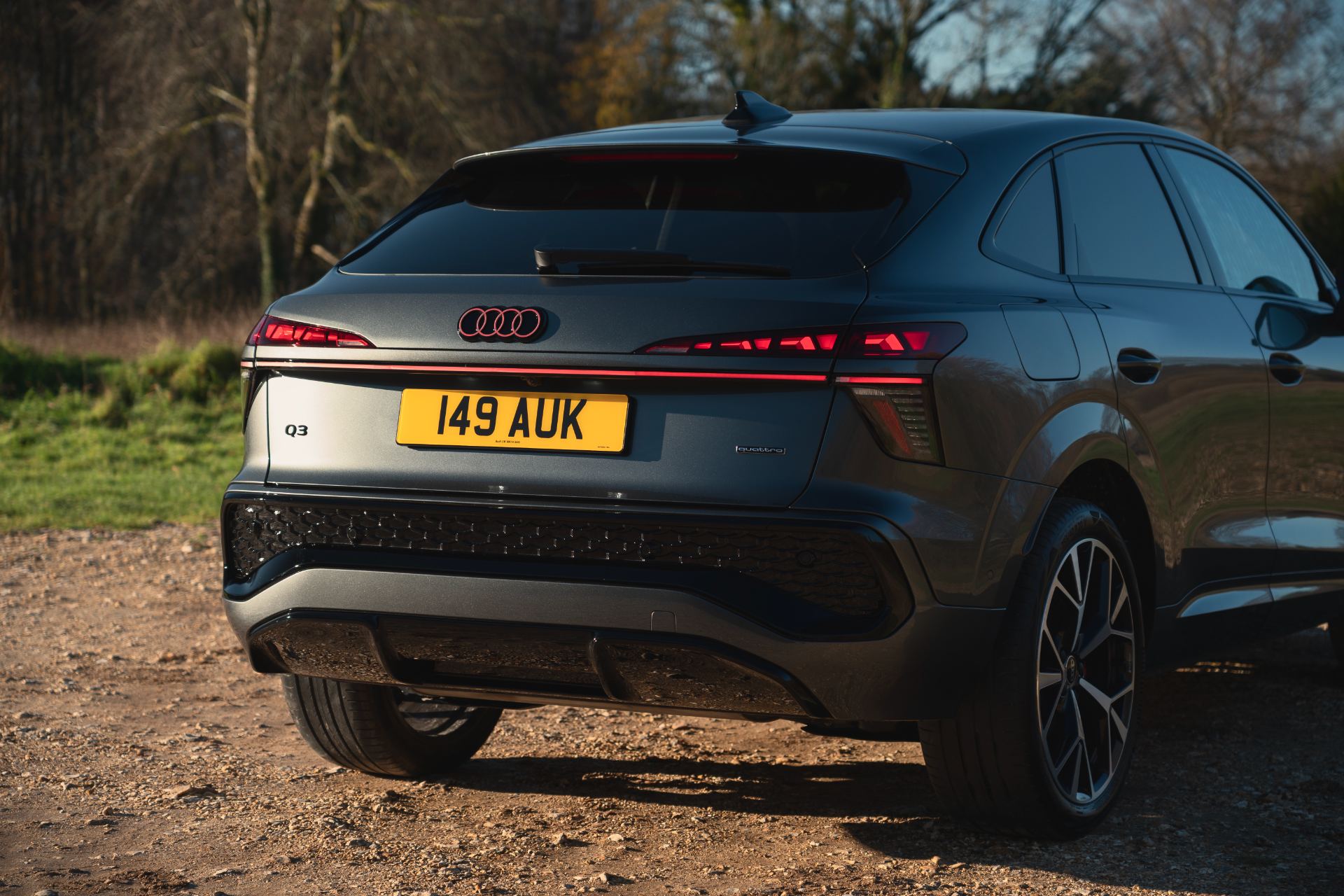 2026 audi q3 sportback rear three quarter heathland grey