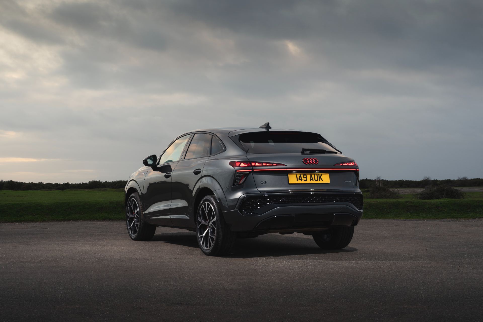 2026 audi q3 sportback rear three quarter dusk grey