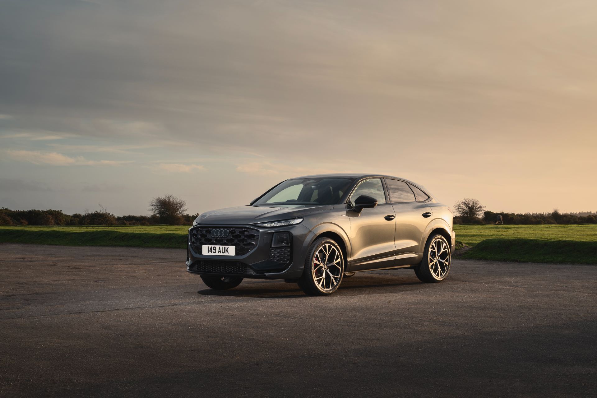 2026 audi q3 sportback front three quarter sunset grey