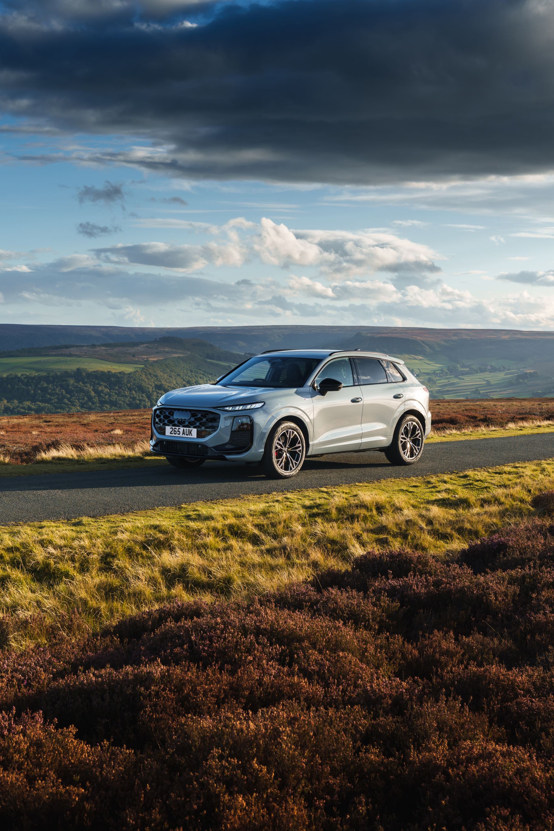 2026 audi q3 front three quarter moorland portrait silver