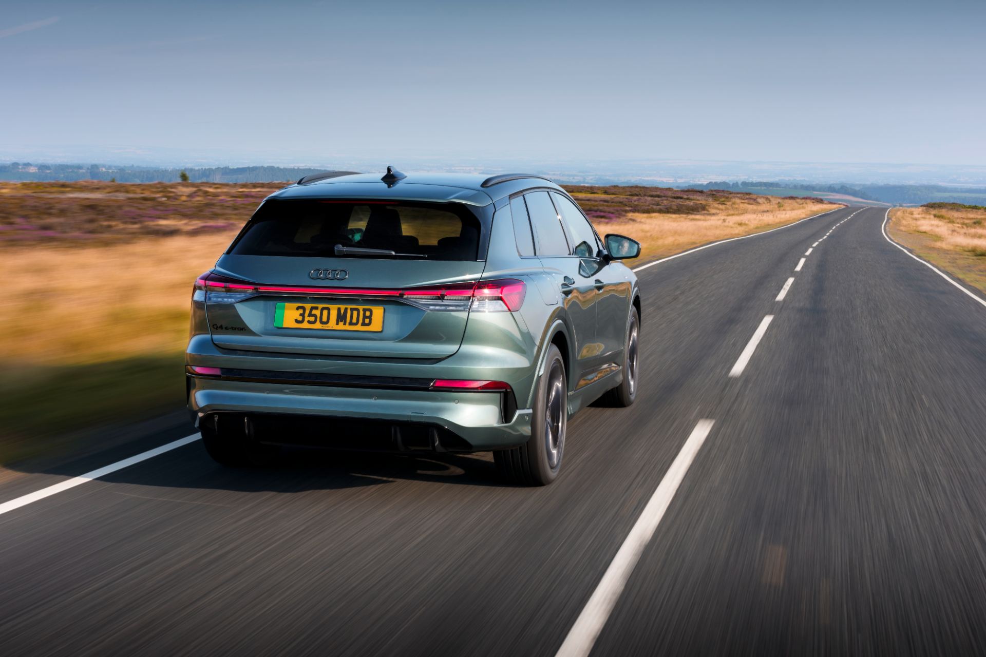 2026 audi q4 e tron driving rear green
