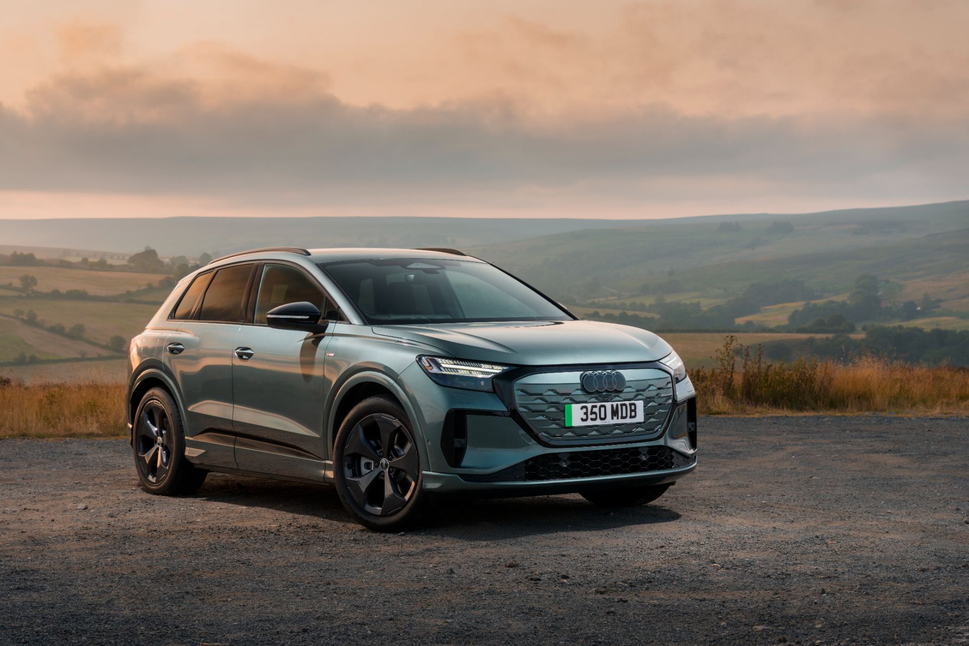 2026 audi q4 e tron front three quarter valley green