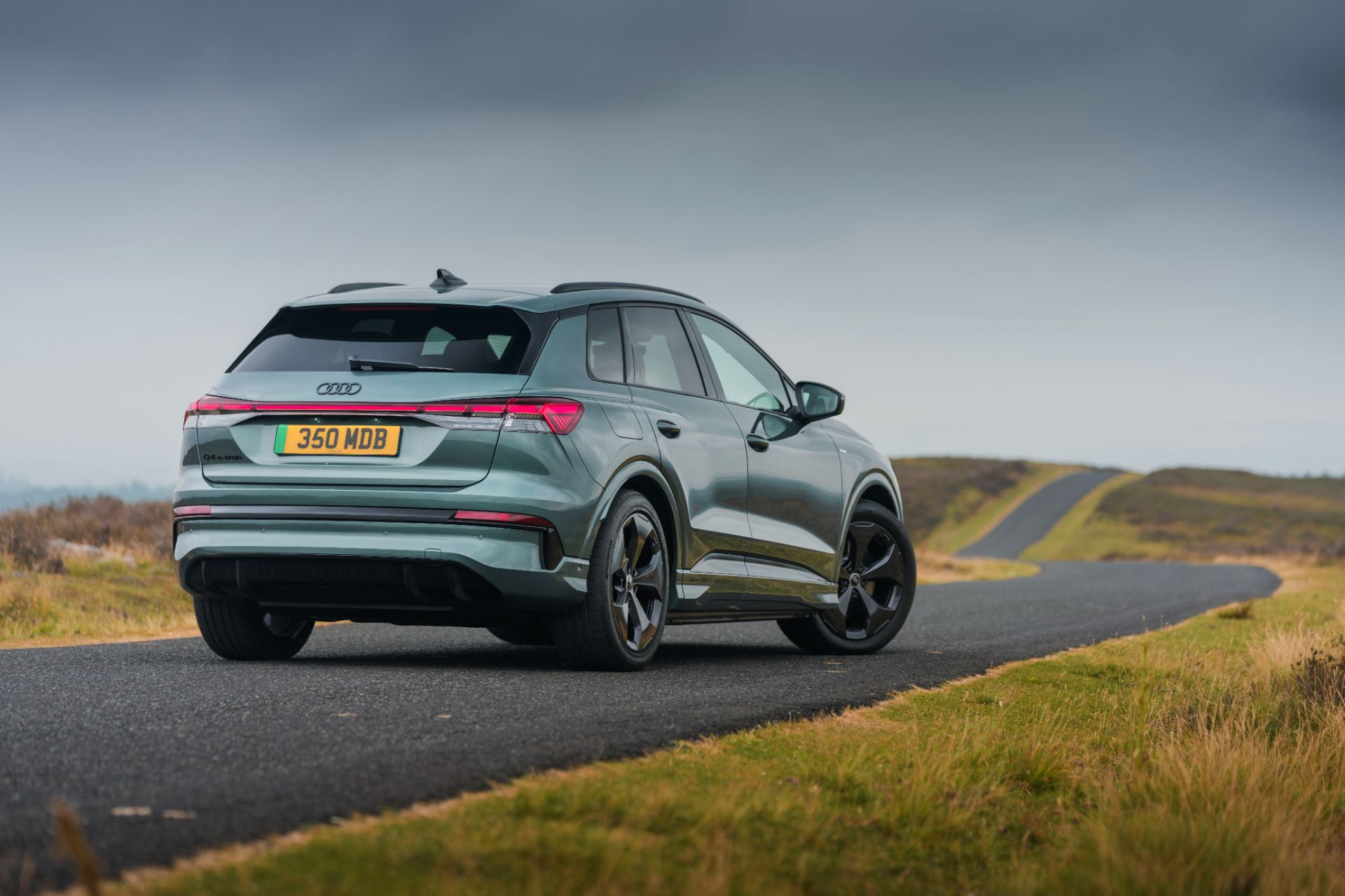 2026 audi q4 e tron rear three quarter bend green