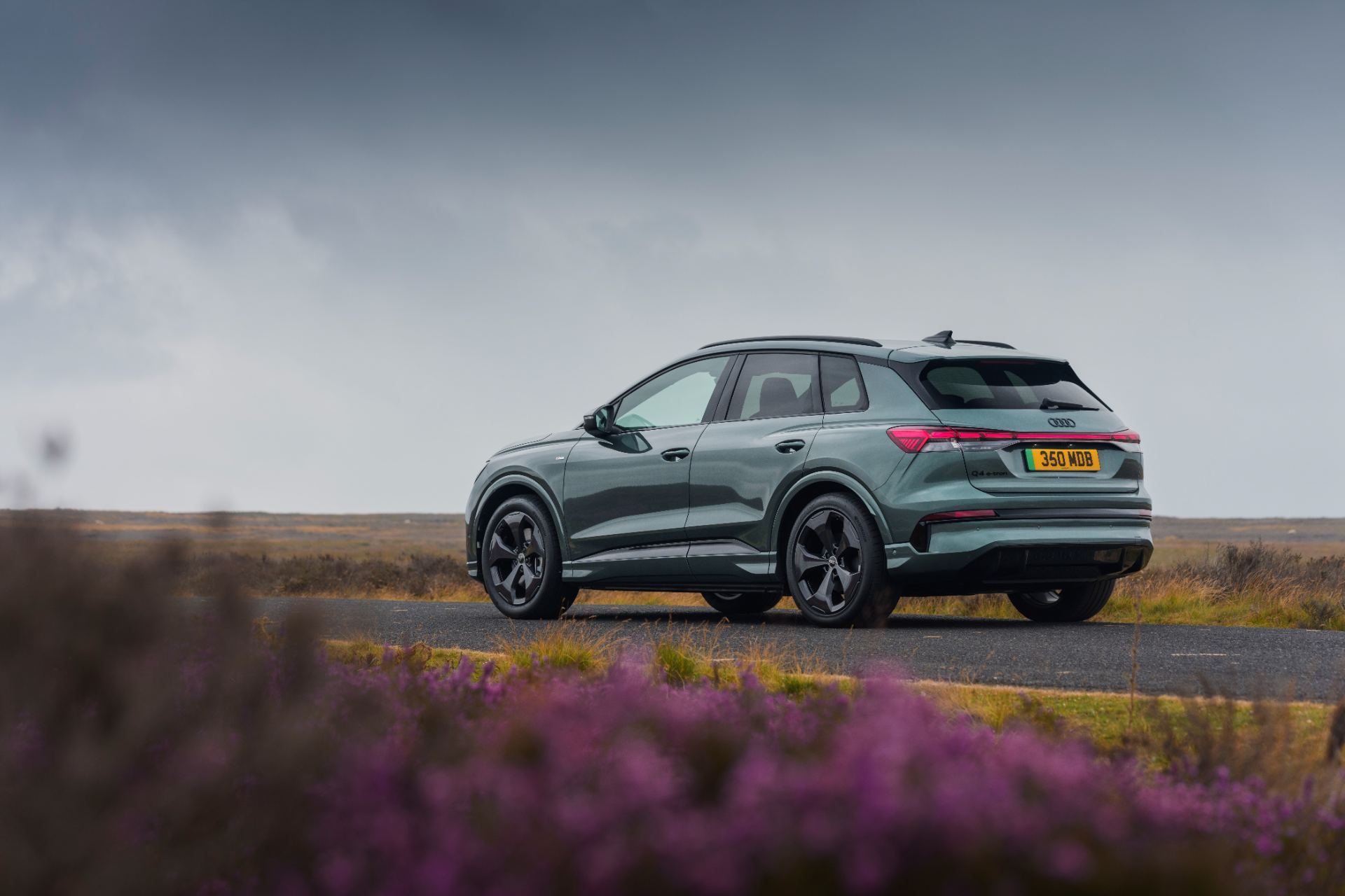 2026 audi q4 e tron rear three quarter heather green