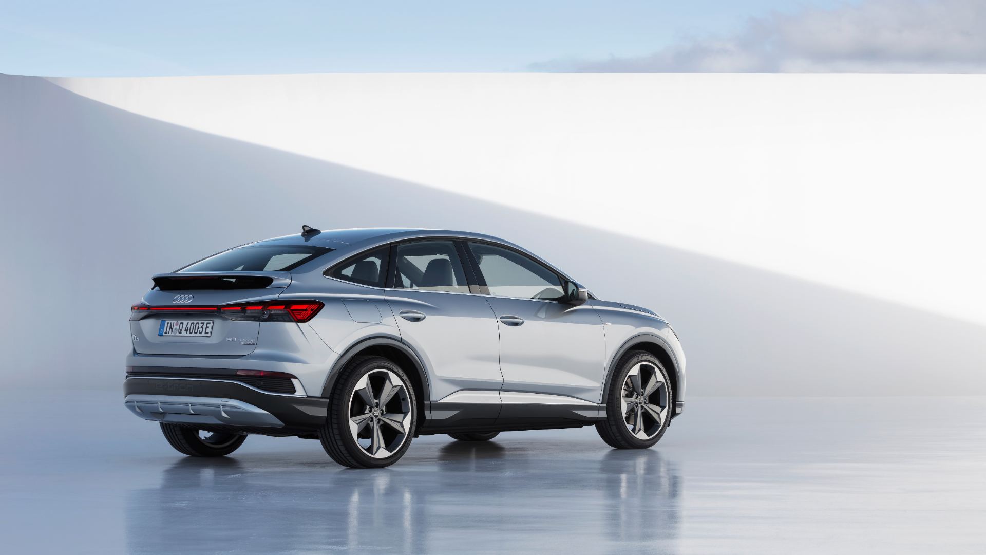 2026 audi q4 sportback e tron rear three quarter studio silver