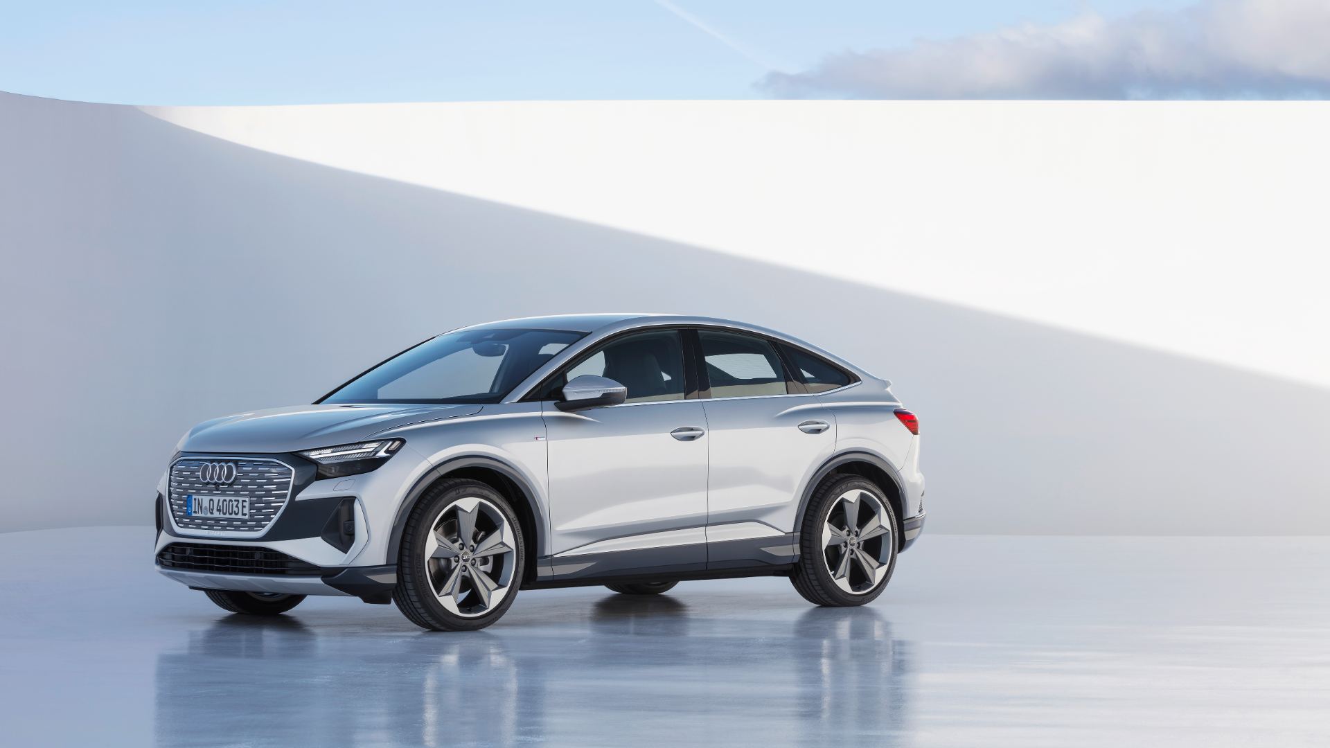 2026 audi q4 sportback e tron front three quarter studio silver