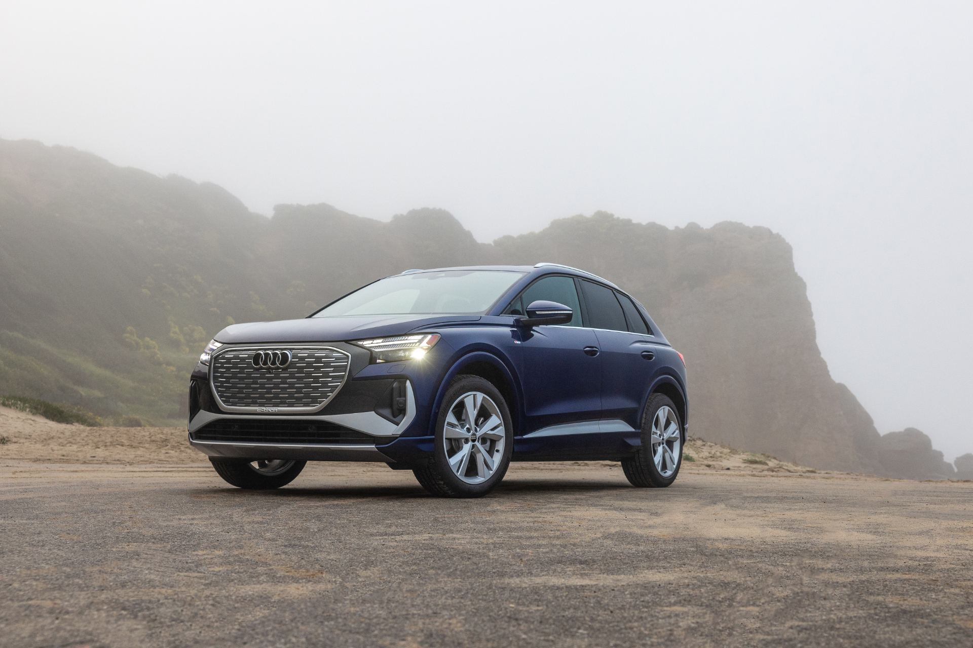 2026 audi q4 e tron front three quarter fog blue