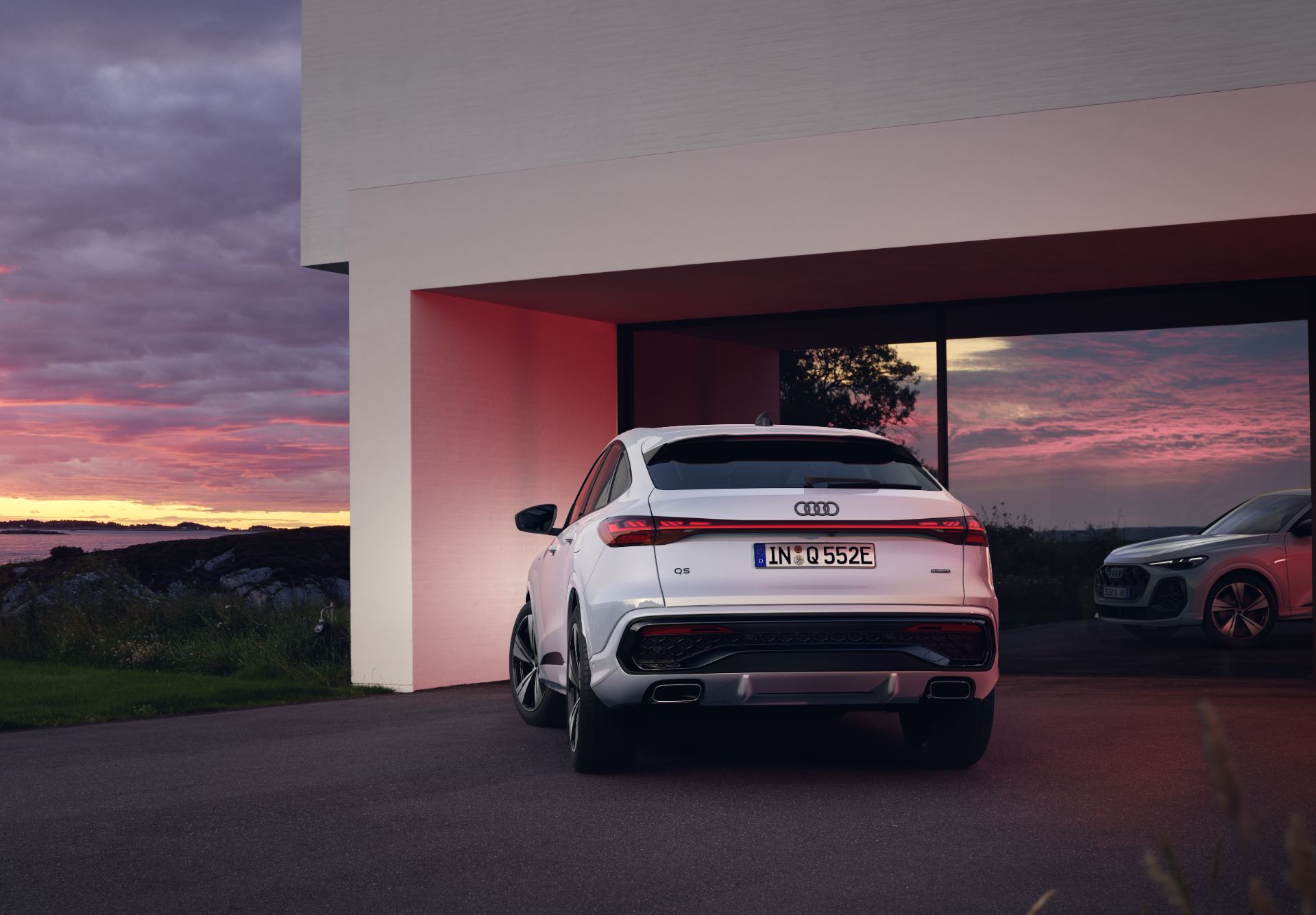 2026 audi q5 sportback e hybrid rear sunset white
