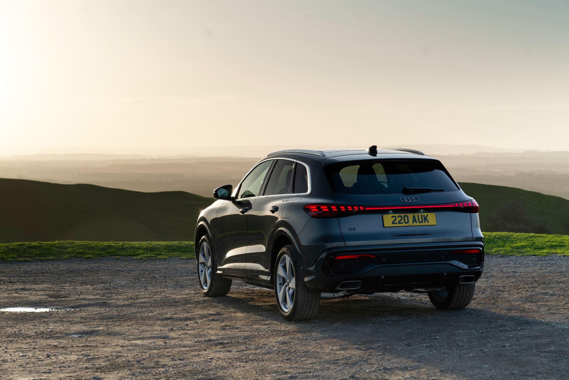 2026 audi q5 suv e hybrid rear three quarter grey
