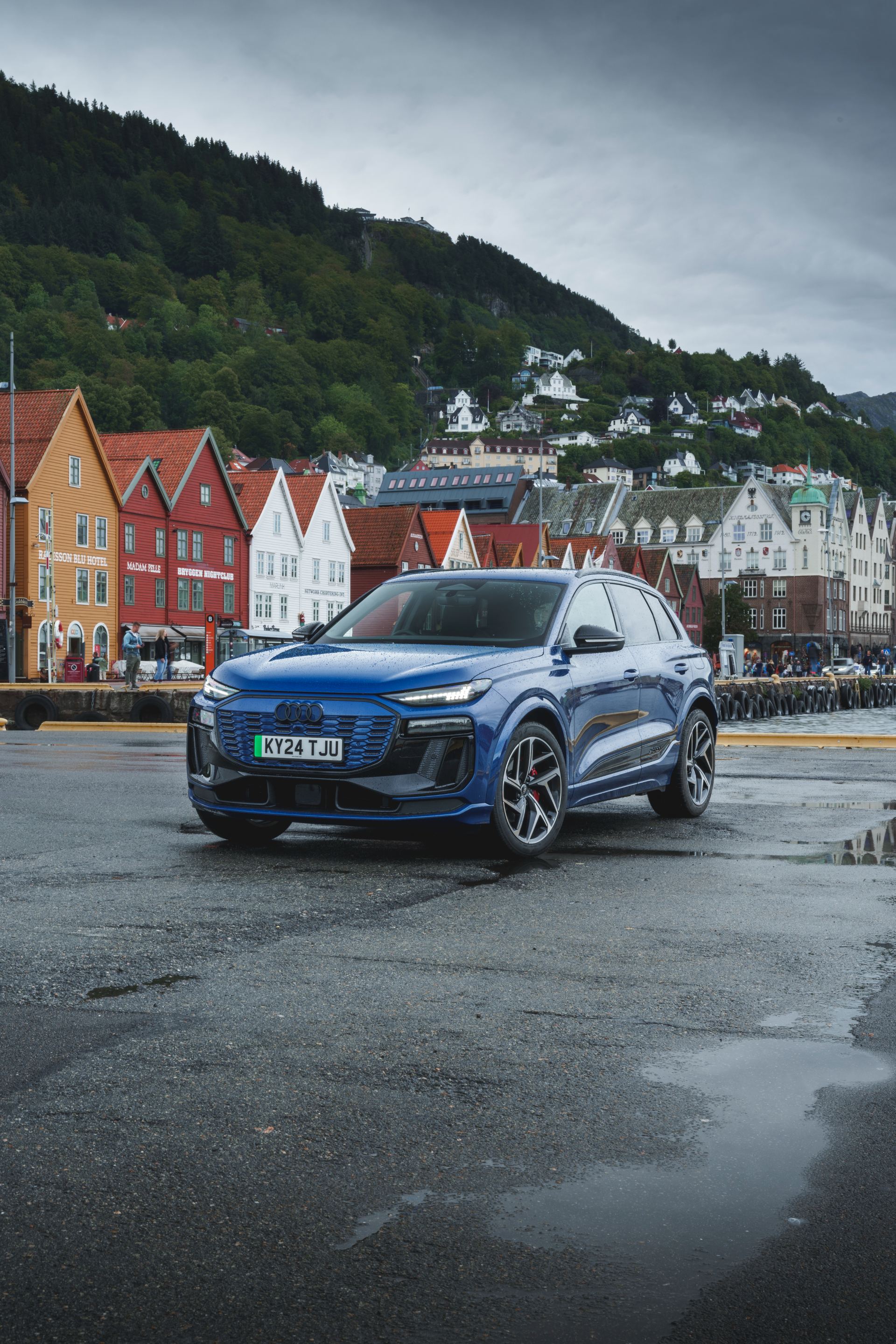 2026 audi q6 e tron front three quarter harbour blue