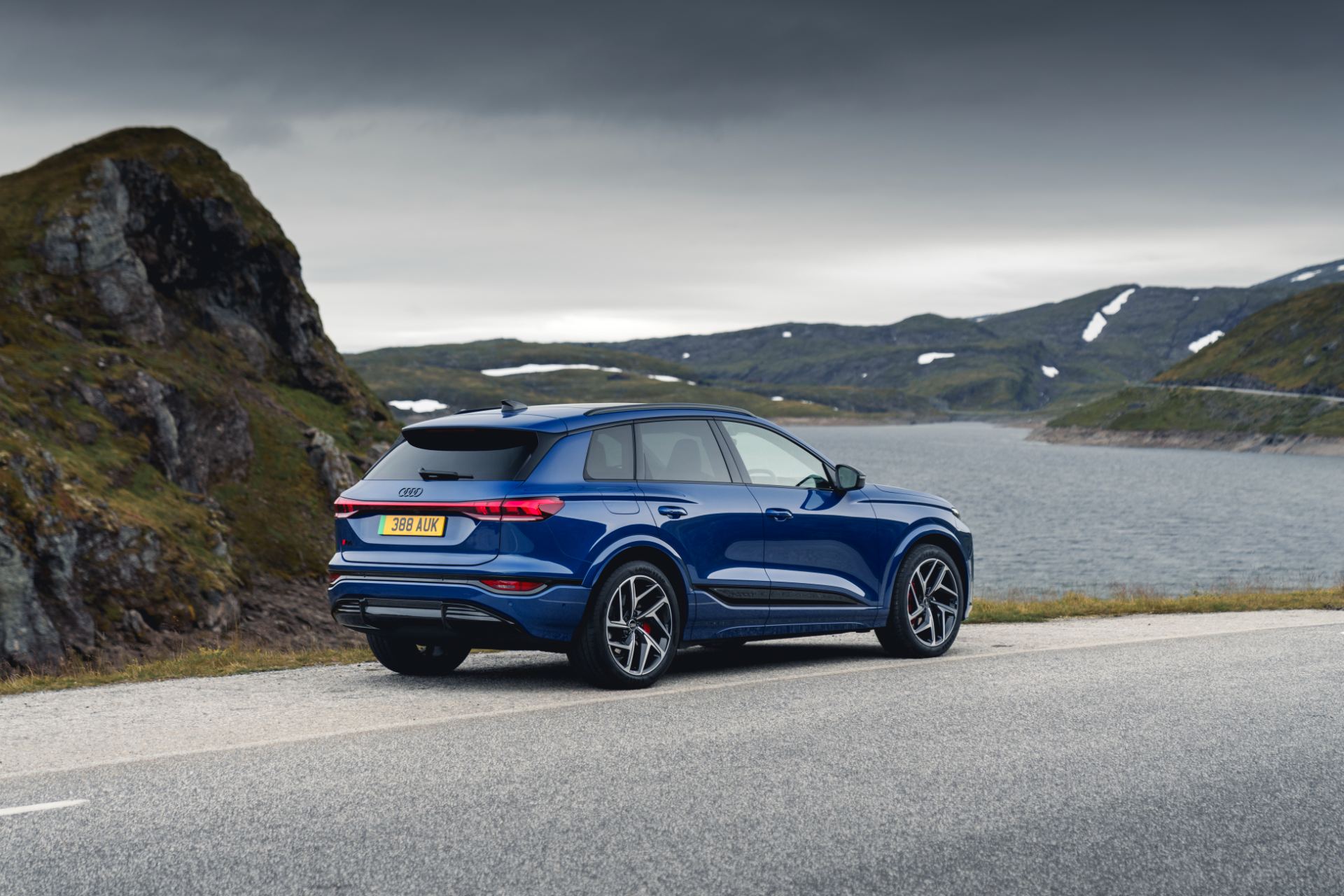 2026 audi q6 e tron rear three quarter lake blue