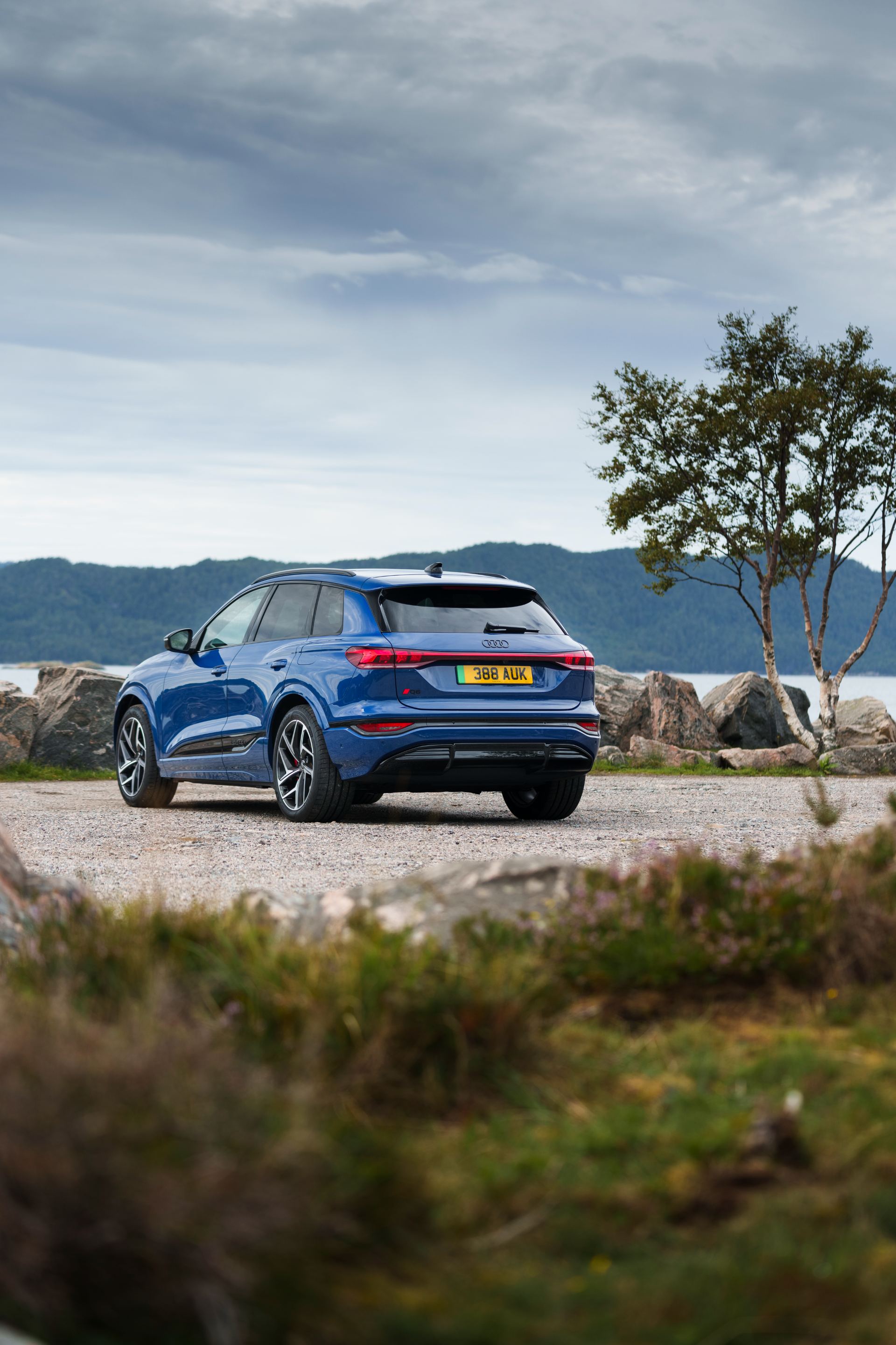2026 audi q6 e tron rear three quarter tree blue