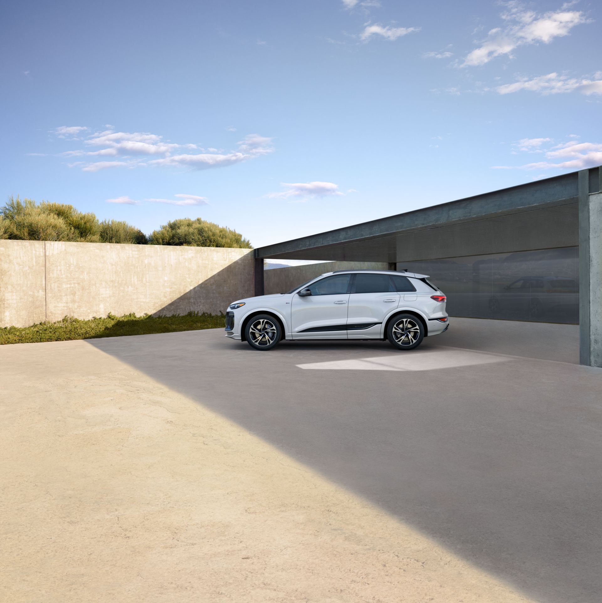 2027 audi q6 e tron side profile carport white